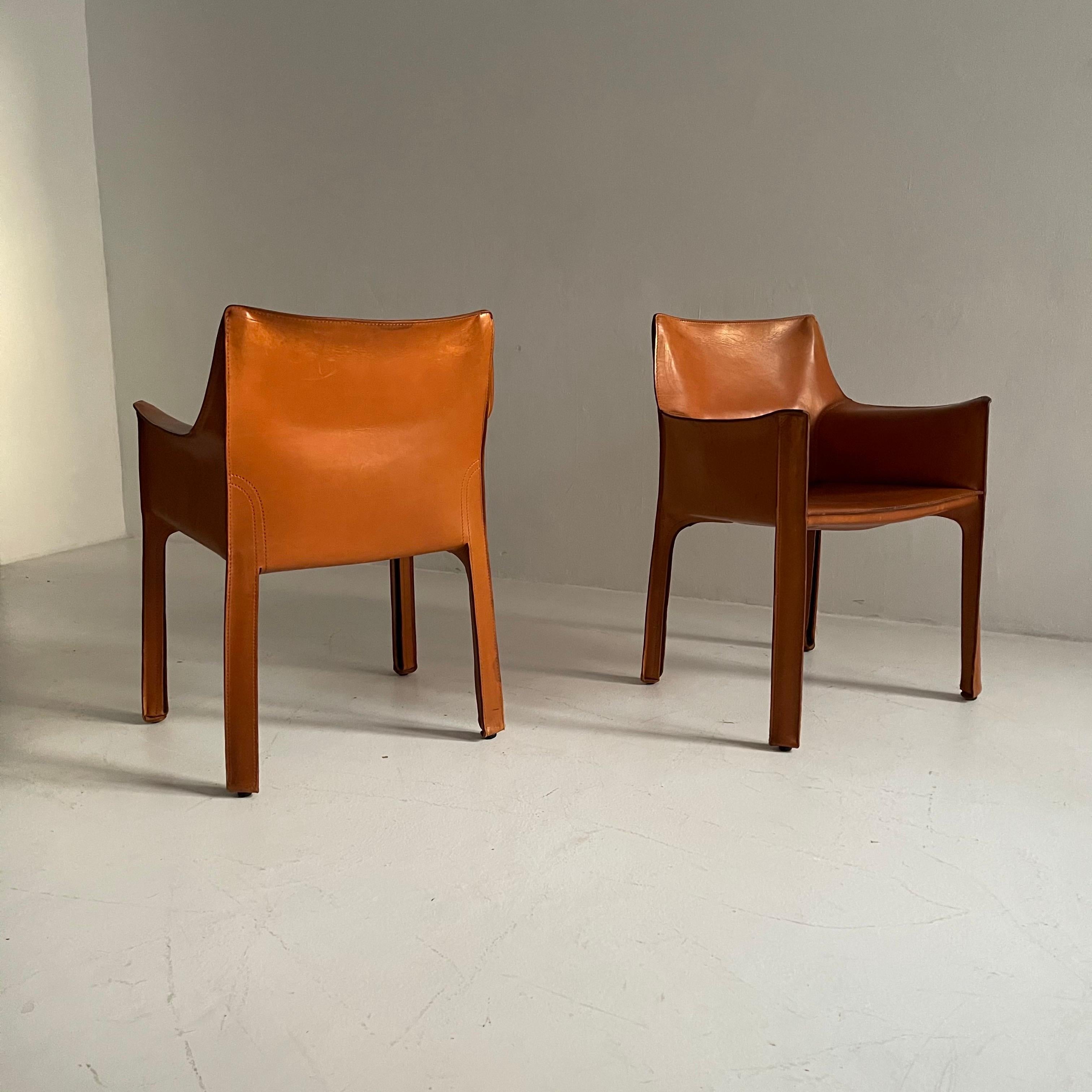 Mario Bellini CAB 413 pair armchairs in patinated cognac leather by Cassina, Italy, 1970s.