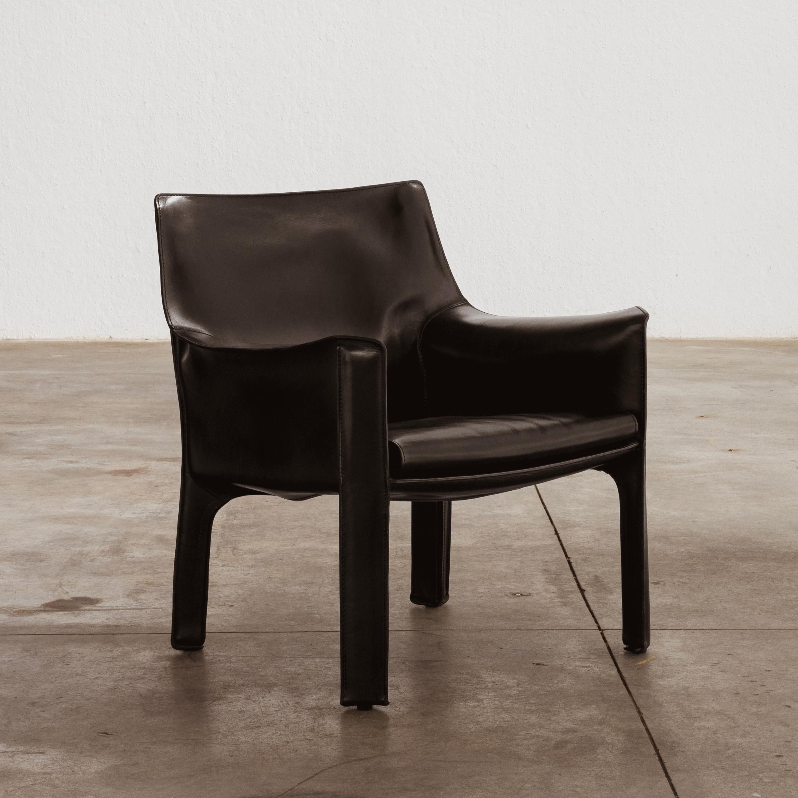Mario Bellini “CAB” 414 dining chairs for Cassina, black leather, Italy, 1977, set of three.

The 