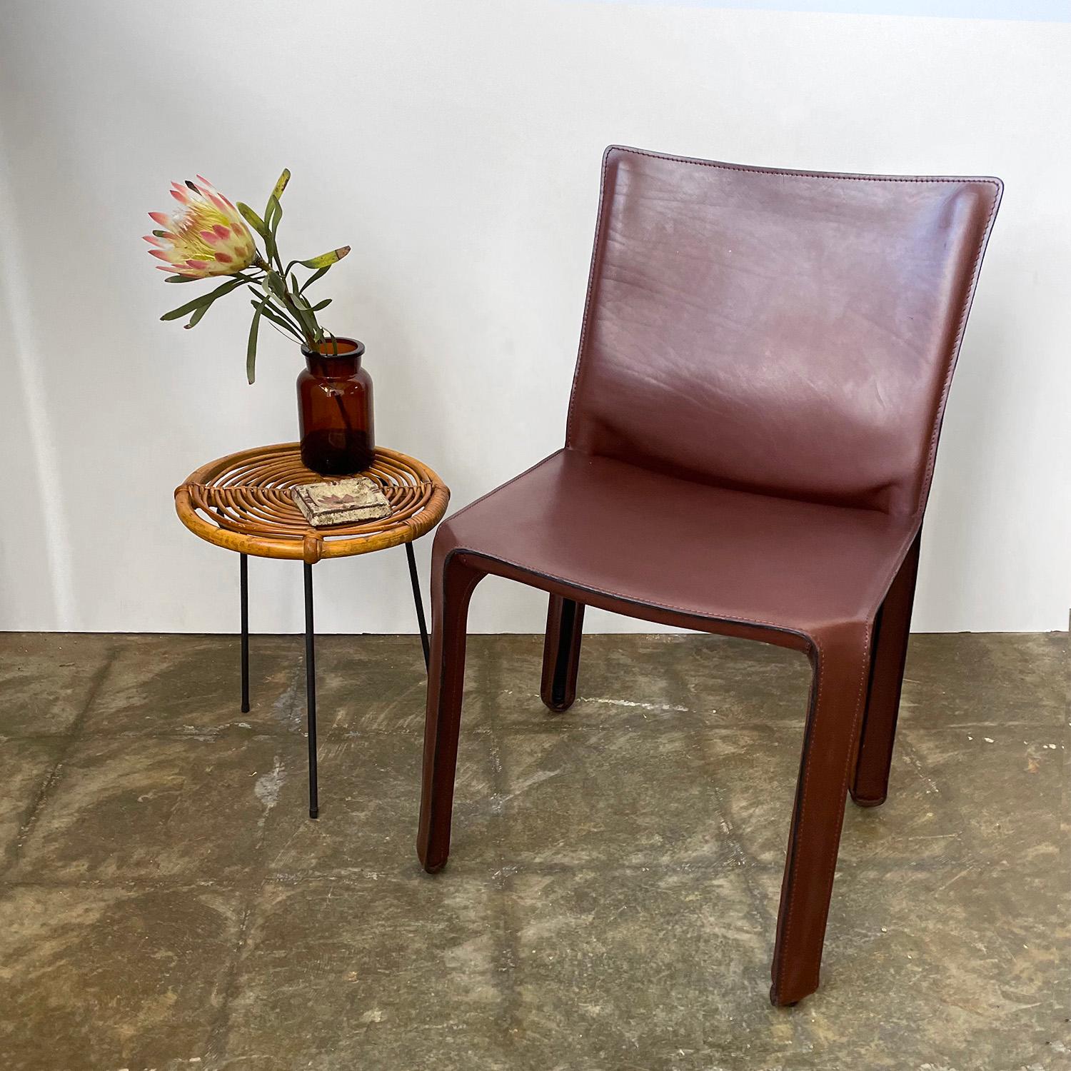 Mario Bellini cab chair manufactured by Cassina
Italy, circa 1970’s
Buttery soft, newly reconditioned, Oxblood leather
Perfectly worn in from years of use
Light patina
Marked identification
Listing is for single chair
Additional single Bellini chair