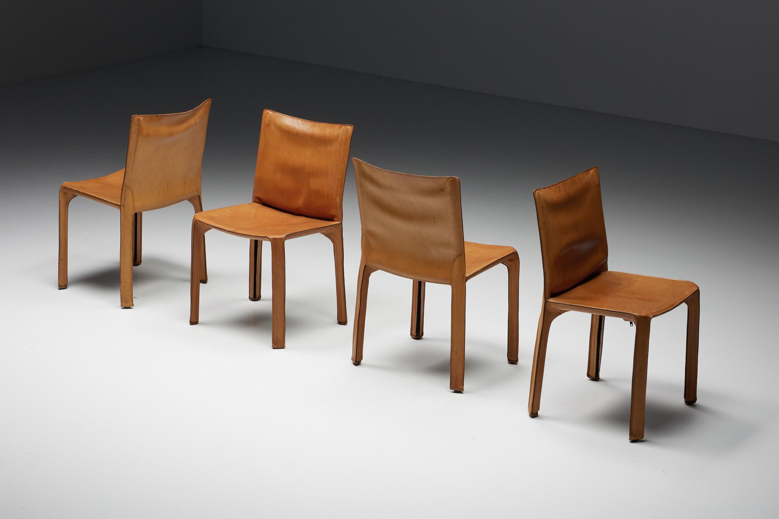 Mario Bellini; Cassina; Mid-Century Modern; Italian design; 1970's Italy; steel; cognac leather; 

CAB-412 dining room chairs in cognac leather designed by Mario Bellini and manufactured by Cassina in the 1970s in Italy. The leather cover is