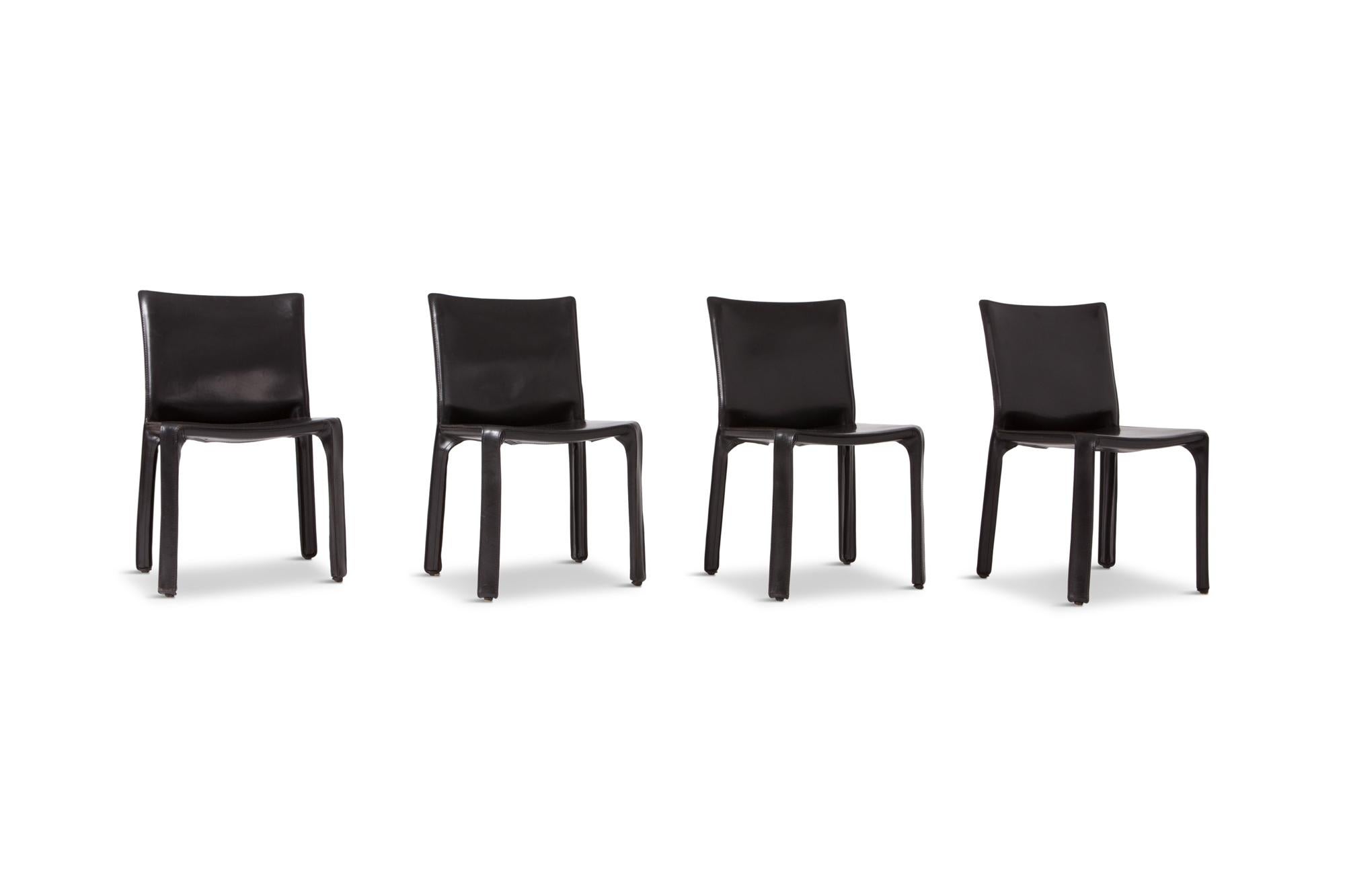 Cassina produced cab chairs, set of four by Mario Bellini, Italy, 1977

Elegant and minimalistic chairs, the base is made from a tubular steel skeleton that is covered with beautiful thick black leather that give these chairs stunning character.