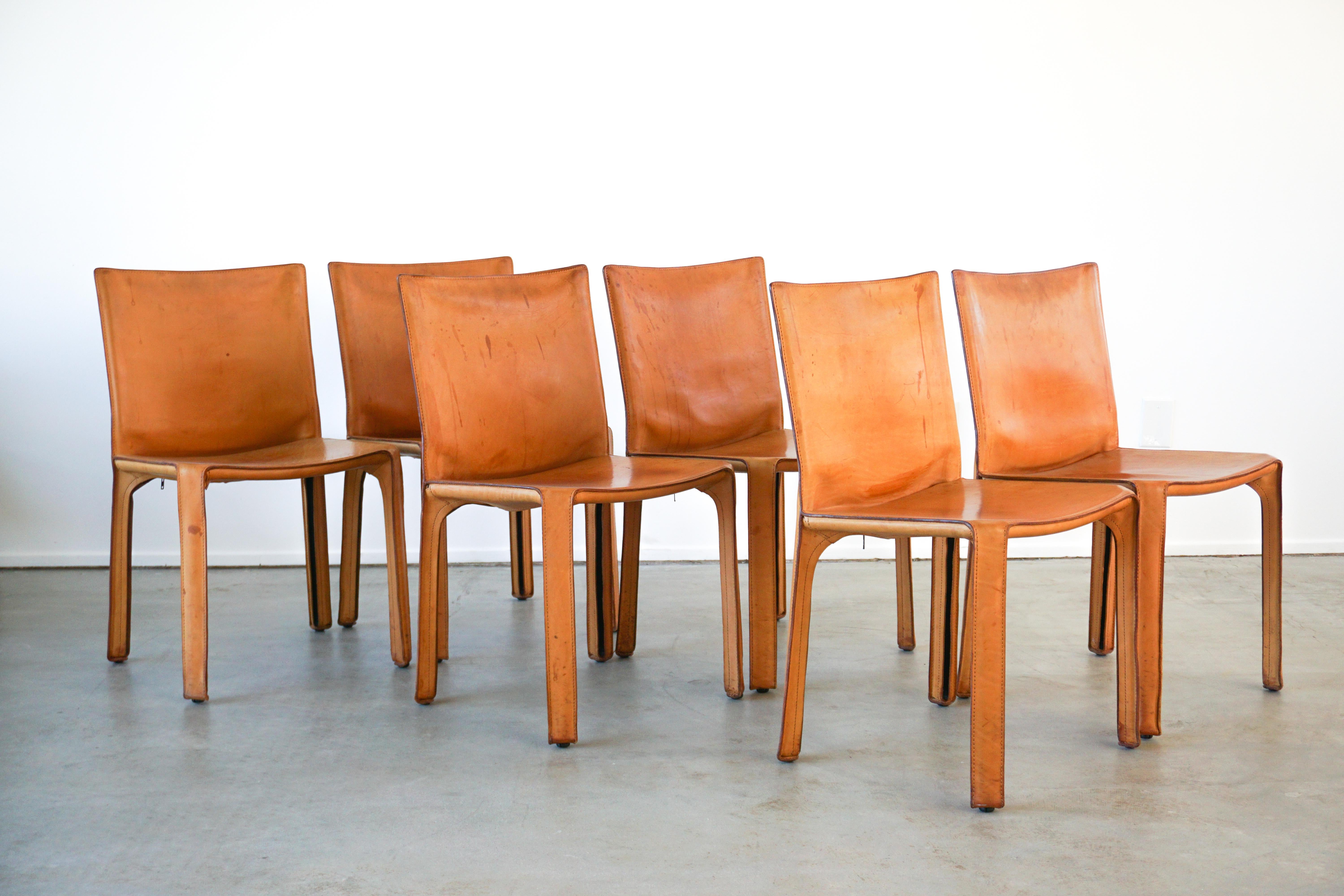 Classic leather cab chairs by Mario Bellini for Cassina.
Great original patina to leather 
Priced individually.
Set of six.