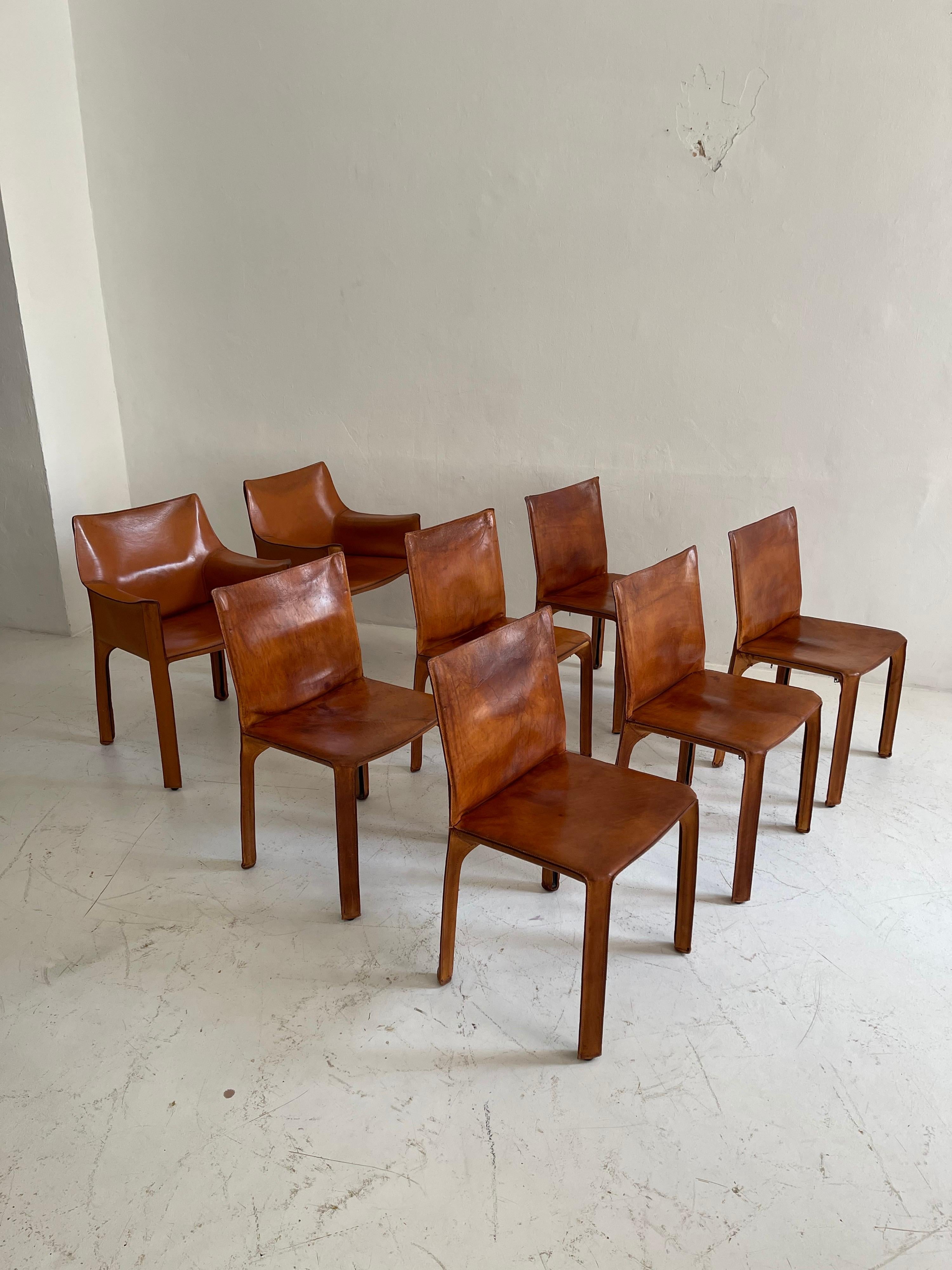 Mario Bellini CAB chairs set of eight Cassina, patinated Cognac leather, 1970s.