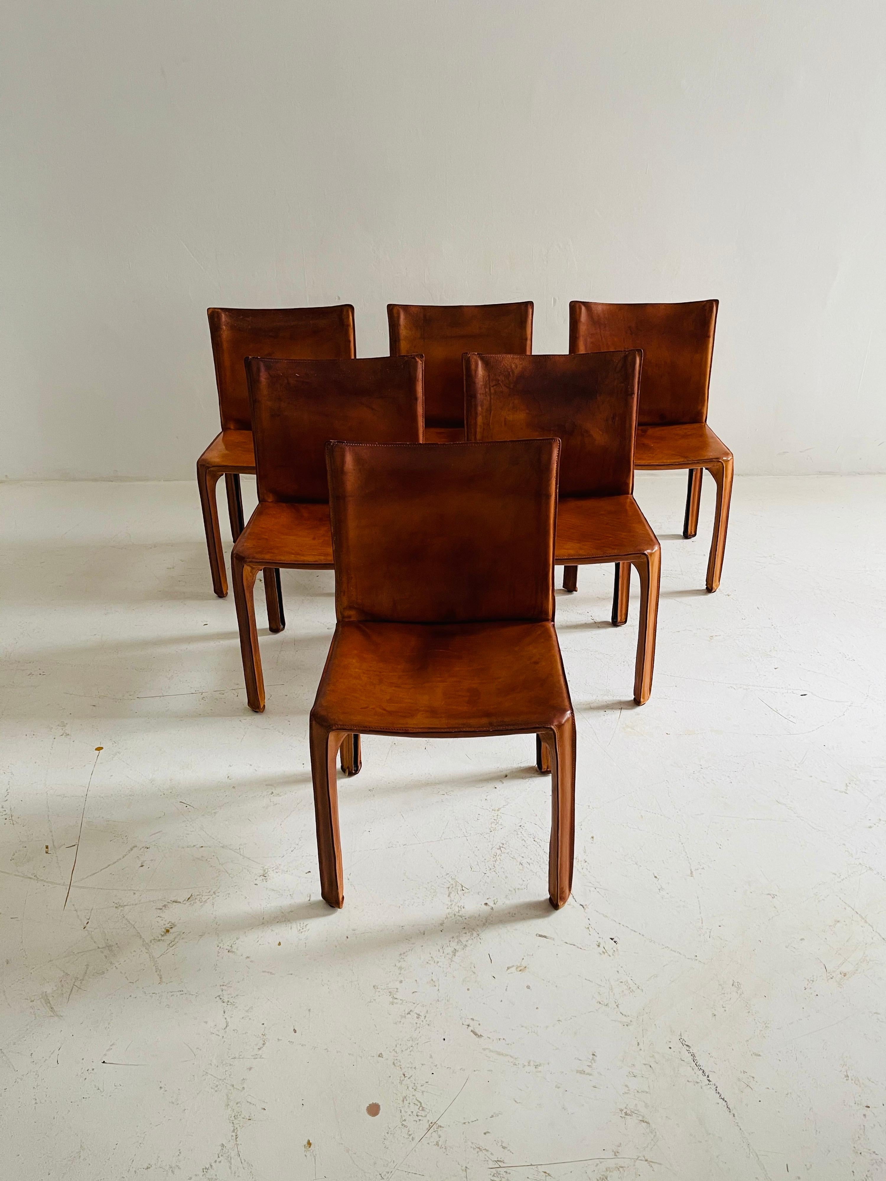 Mario Bellini CAB chairs set of six by Cassina, patinated cognac leather, 1970s.