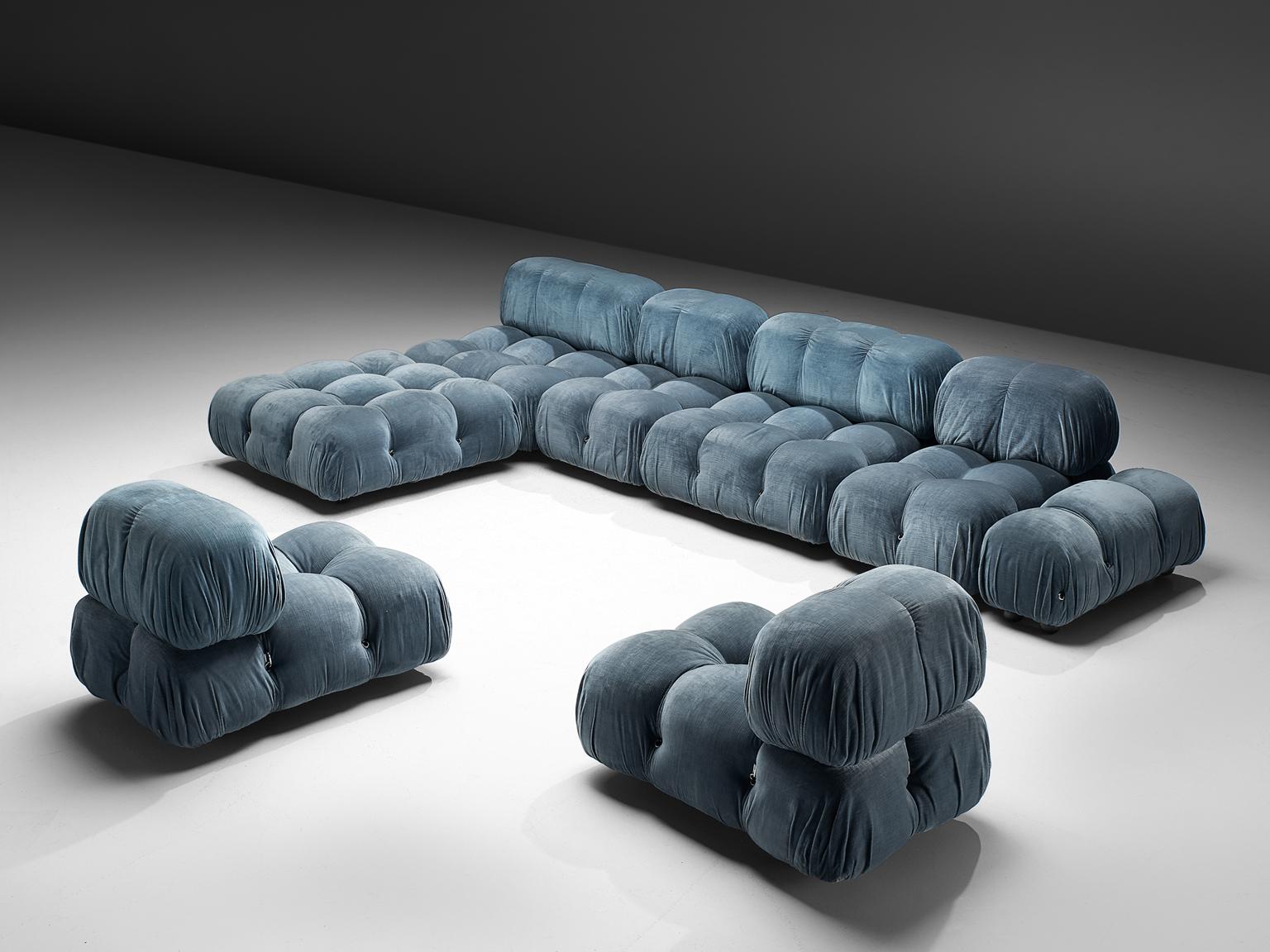 Mario Bellini, large modular 'Cameleonda' sofa in blue velvet, Italy 1972.

The sectional elements of this sofa can be used freely and apart from one another. The upholstery on this piece features a sea blue velvet. The backs and armrests are