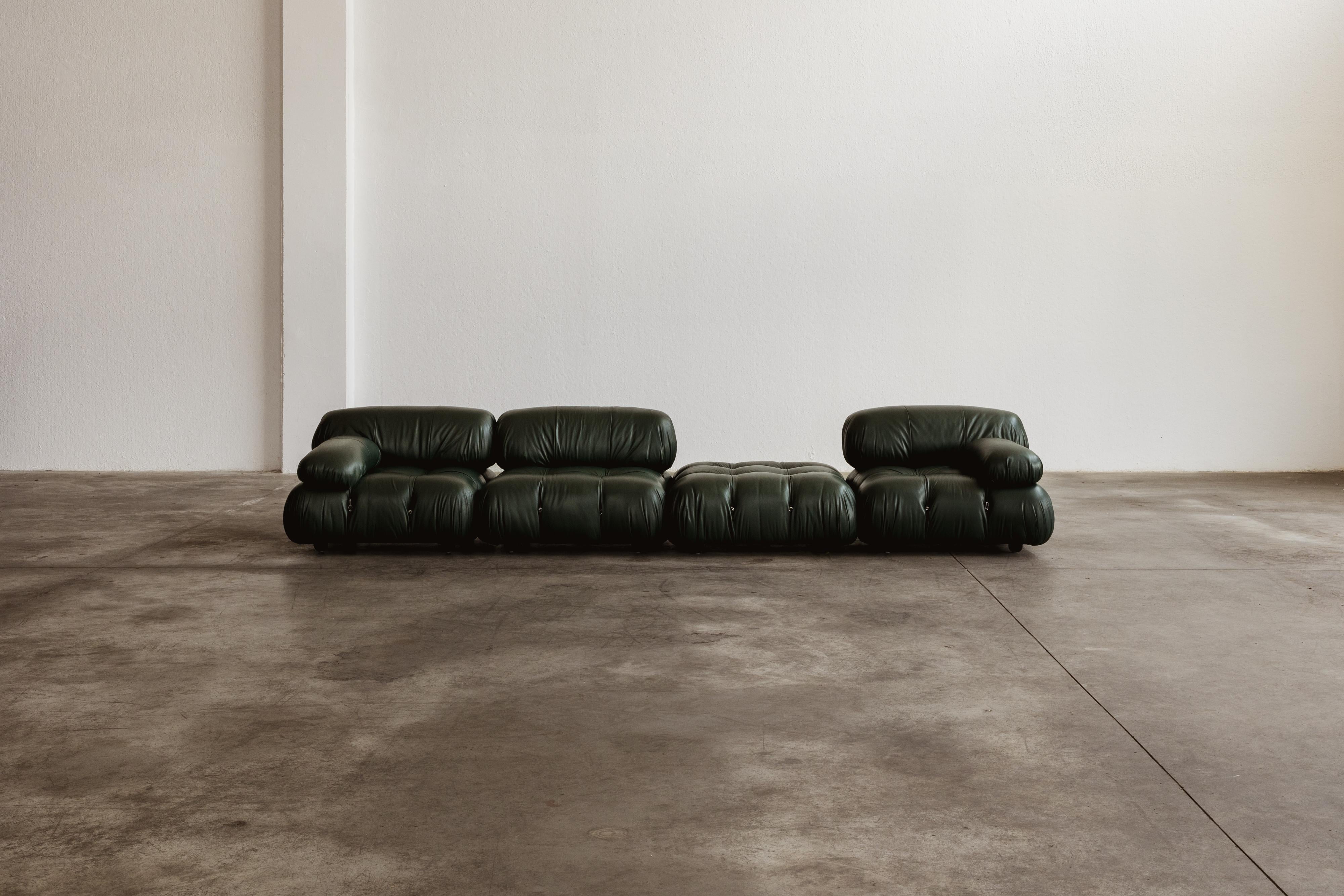 Mario Bellini “Camaleonda” modular sofa for B&B Italia, dark green leather, 1970, set of four.

“Camaleonda” is an icon, rediscovered. It was one of the truly modular sofa designs, evolving through contemporary living rooms like a wonderfully soft