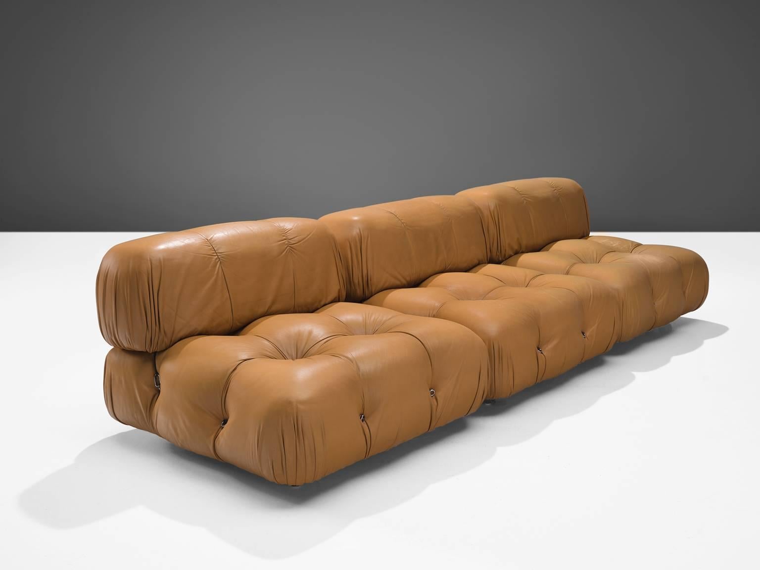 Mario Bellini, modular 'Camaleonda' sofa in original cognac leather upholstery, Italy, 1972.

The sectional elements of this can be used freely and apart from one another. The backs and armrests are provided with rings and carabiners, which allows