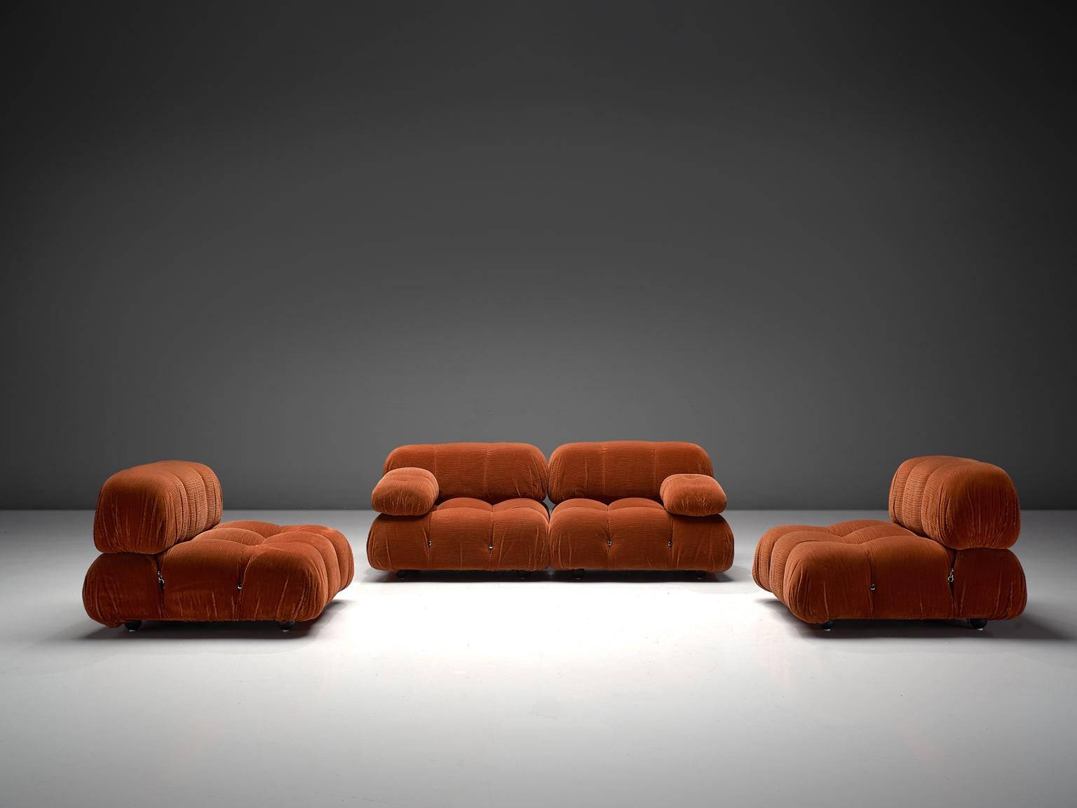 Mario Bellini, modular 'Cameleonda' sofa in in orange corduroy, Italy 1972.

The sectional elements of this sofa can be used freely and apart from one another. The upholstery on this piece features an orange original velvet. The backs and armrests