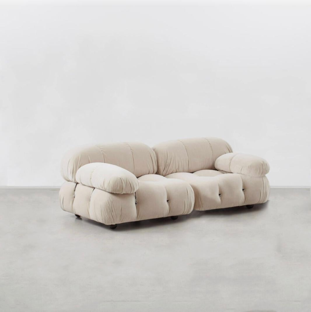 This modular sofa was designed by Mario Bellini in 1971 and was manufactured first by C&B and later by B&B Italia. The backs and armrests are provided with rings and carabiners, which allows the user to create the desired configuration best suited