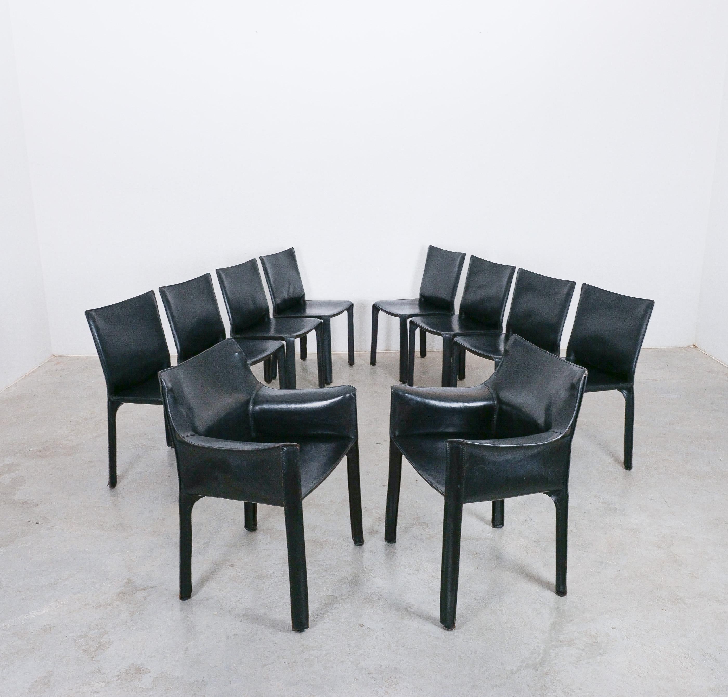 Wonderful set of 10 dining chairs by Mario Bellini 1980's; 
2x cab 413 and 8x cab 412 by Cassina

A set of ten (10)  Italian design icons in black saddle leather, the CAB 412/413 chair by Mario Bellini for Cassina is up for sale. It consist of a set