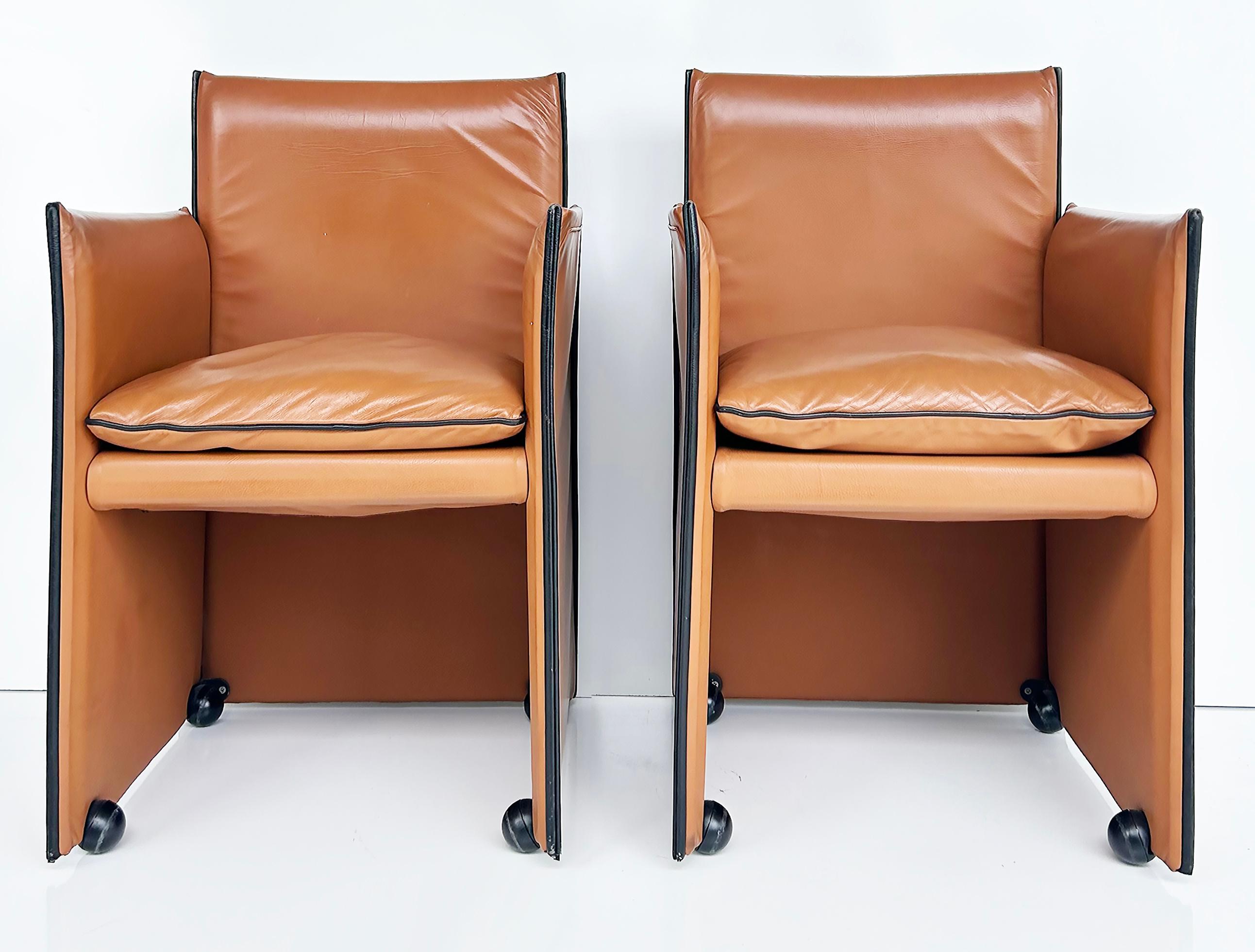Mario Bellini Cassina Italian 401 Break Leather Armchairs, 1980s Pair

Offered for sale is a pair of iconic chairs designed by Mario Bellini for Cassina in the 1980s.  The 