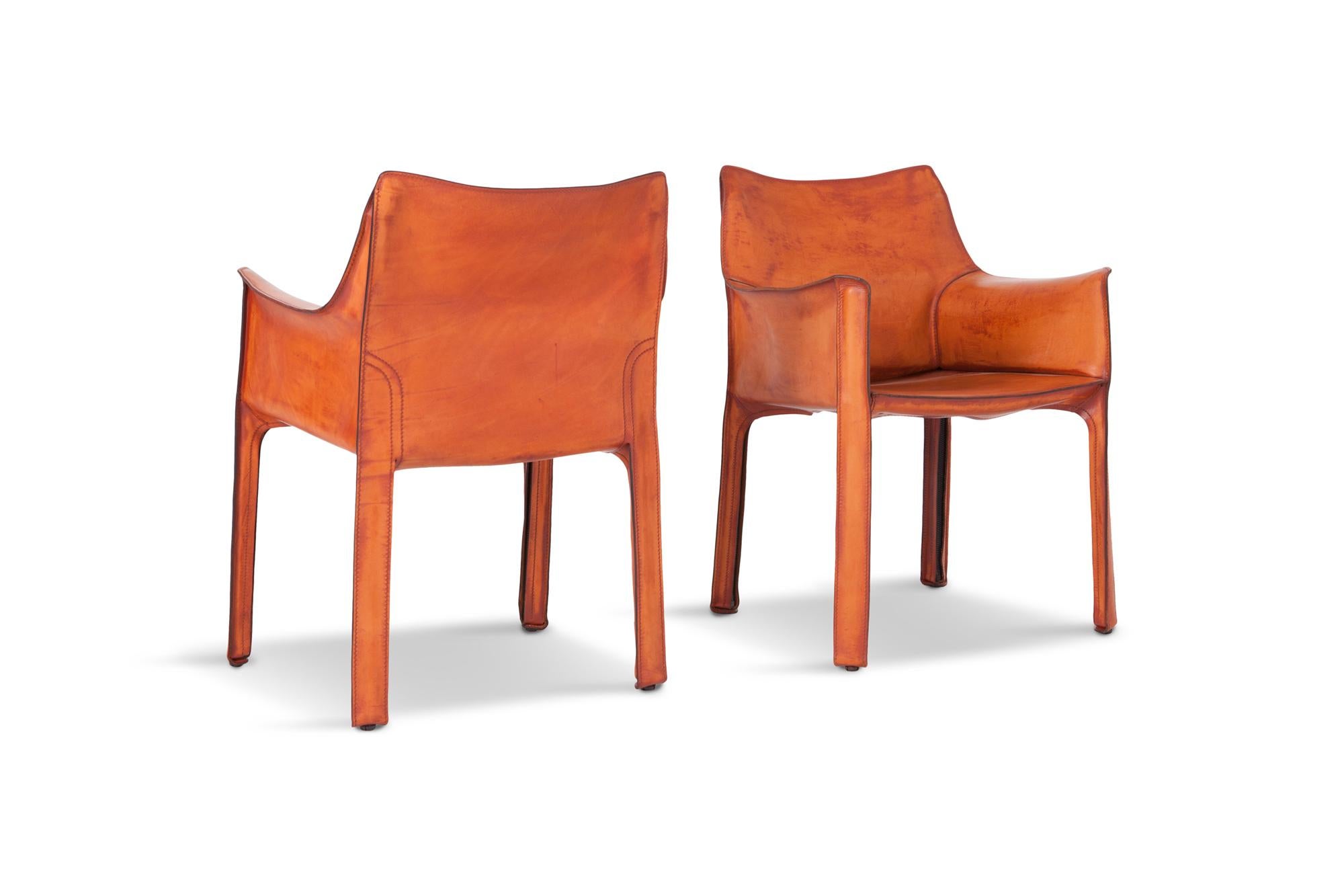 CAB 413 armchairs in cognac leather by Mario Bellini.

Gorgeously patinated natural Cognac leather, wonderful wear and tear giving these chairs a ton of character. ??

Sold as a pair.

Italy, 1970’s

W 58 D 52 H 81 SH 44 cm
