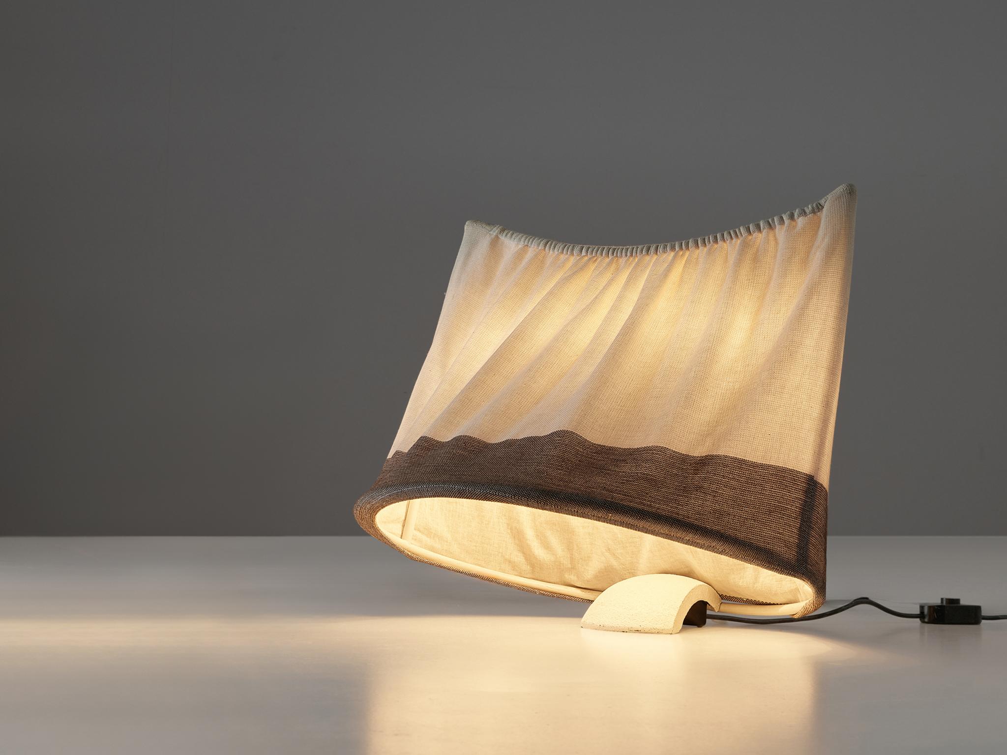 Mario Bellini for Artemide, table or floor lamp, lacquered metal, canvas, Italy, 1978. 

Quirky and quite unique, this 'circo' table lamp designed by Mario Bellini, is a true example of Bellini's original approach towards furniture design. The