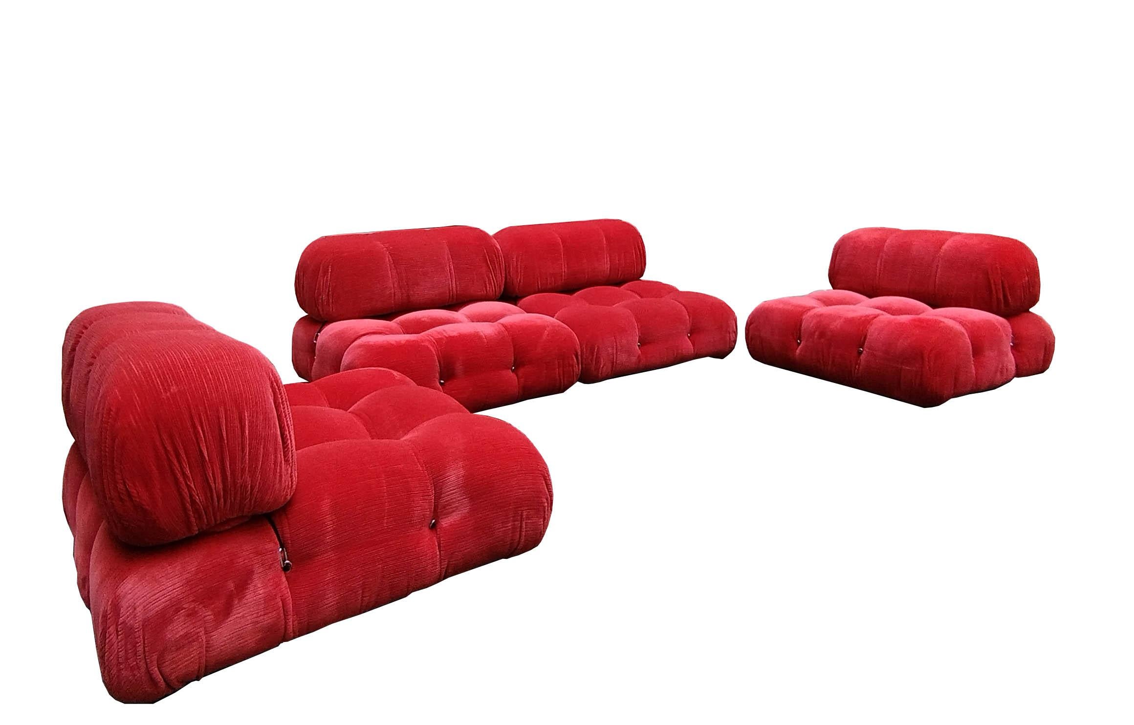 Mario Bellini, large modular sofa 'Cameleonda', red fabric covering, Italy, designed in 1971

The modular elements of this sofa can be used freely and separately from each other. The backrests and armrests are fitted with rings and snap hooks,