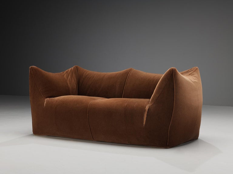 Mario Bellini for B&B Italia, 'Le Bambole' sofa, fabric, Italy, 1972. 

This comfortable red brown two seat sofa is bulky and playful, shaped as if it is merely a large cushion and the accompanying feeling is the same. It is designed by Mario