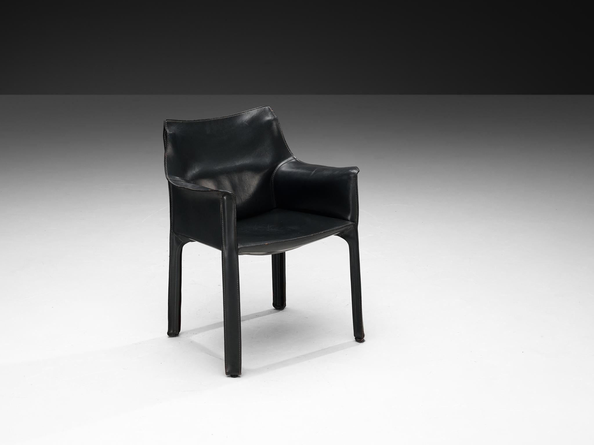 Mario Bellini for Cassina, armchair, model 'CAB 413', leather, Italy, 1979

The iconic ‘CAB’ chair was designed by Mario Bellini in 1979. Conceptually new was the way Bellini uses leather to cover the whole chair in one monochrome layer. The dark