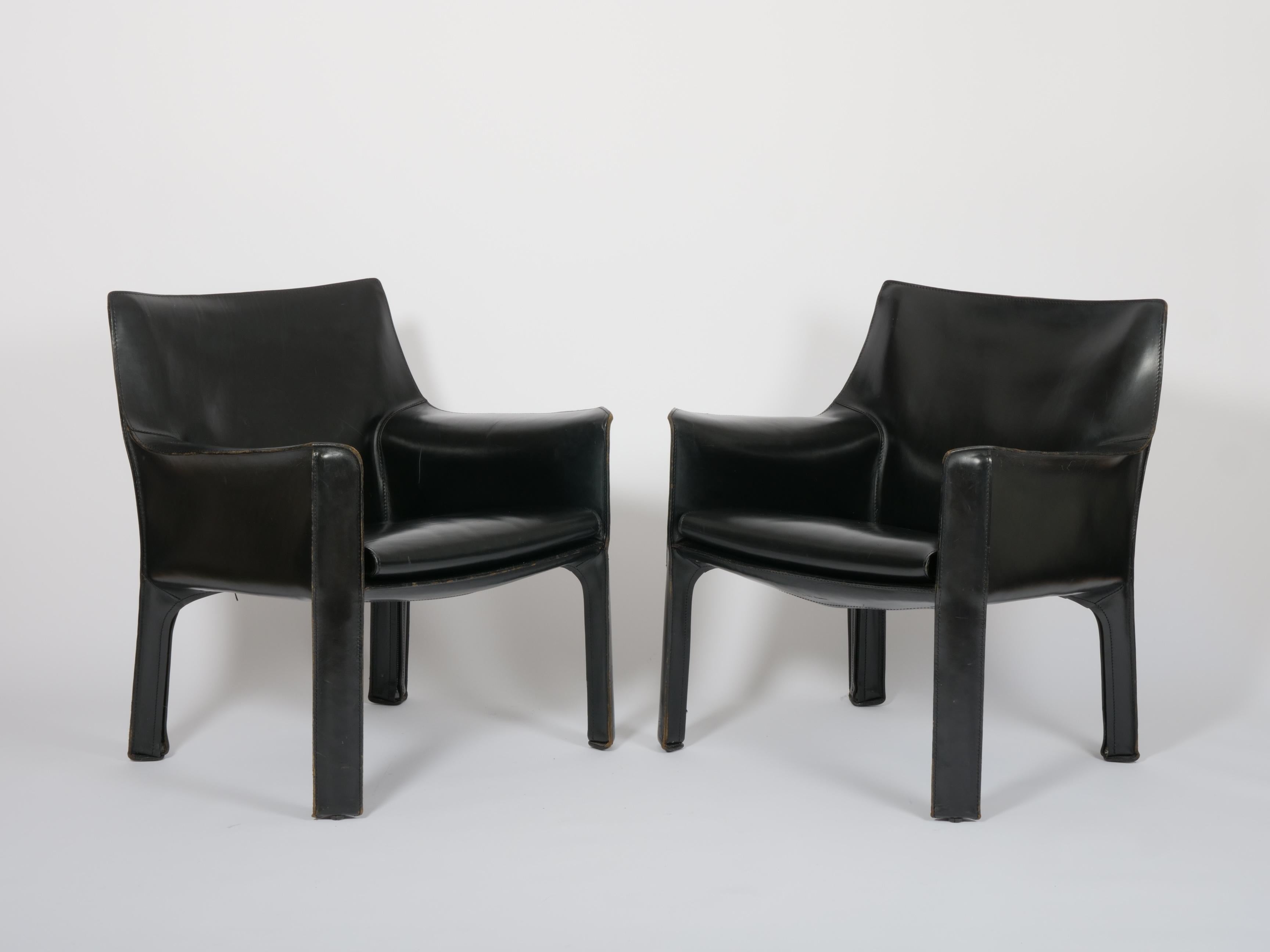 Mario Bellini for Cassina 'Cab' chairs. Model no 414. 

Stitched black leather. Zips onto a metal frame.

In very good condition. Leather, stitching and zips on these chairs are all very good. 

