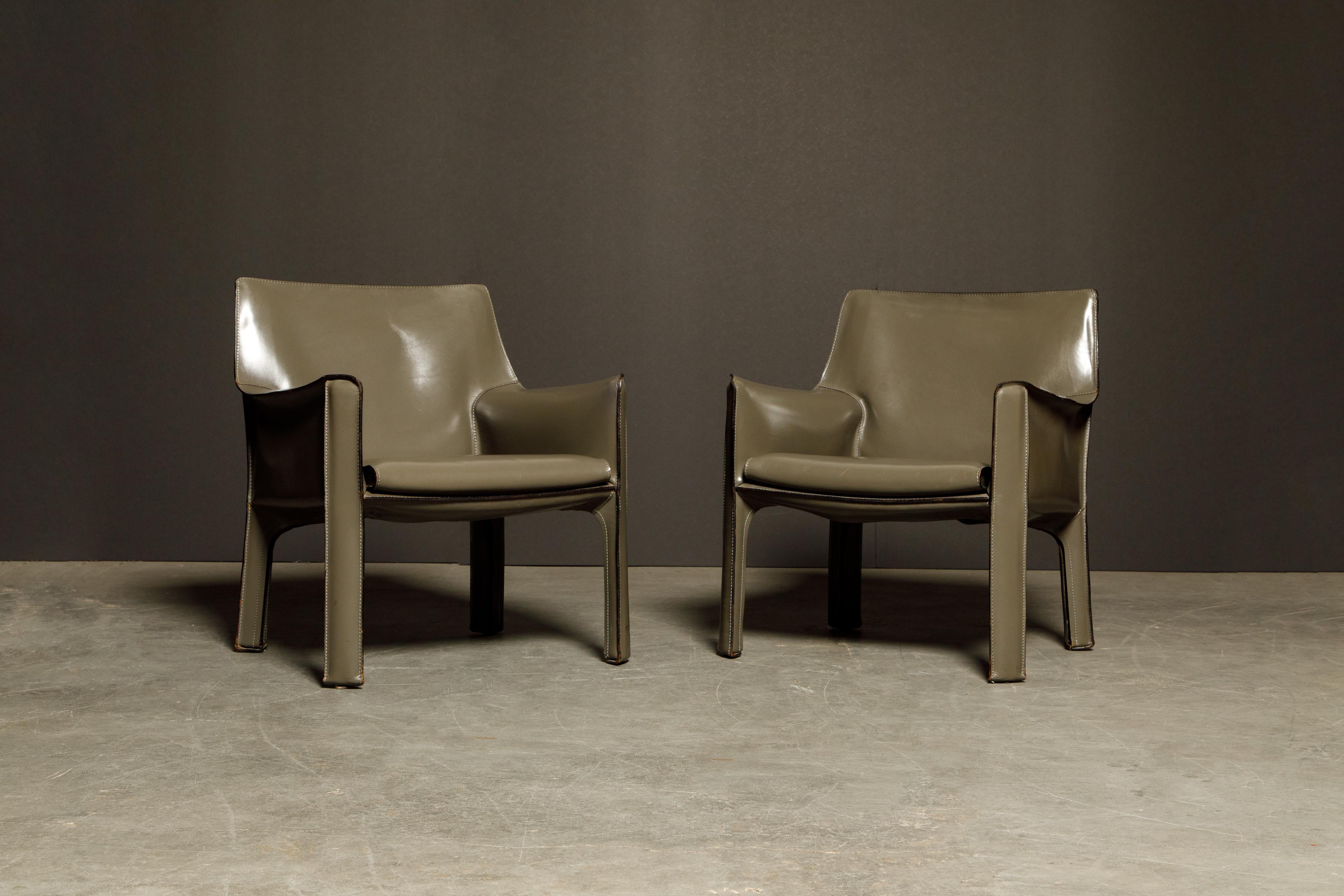 A beautiful pair of Mario Bellini Cab lounge chairs, Model #414, in exemplary condition, signed Cassina, designed in the 1970s. These fine examples of the cab line by Mario Bellini for Cassina are classic staples for luxury interior designers and
