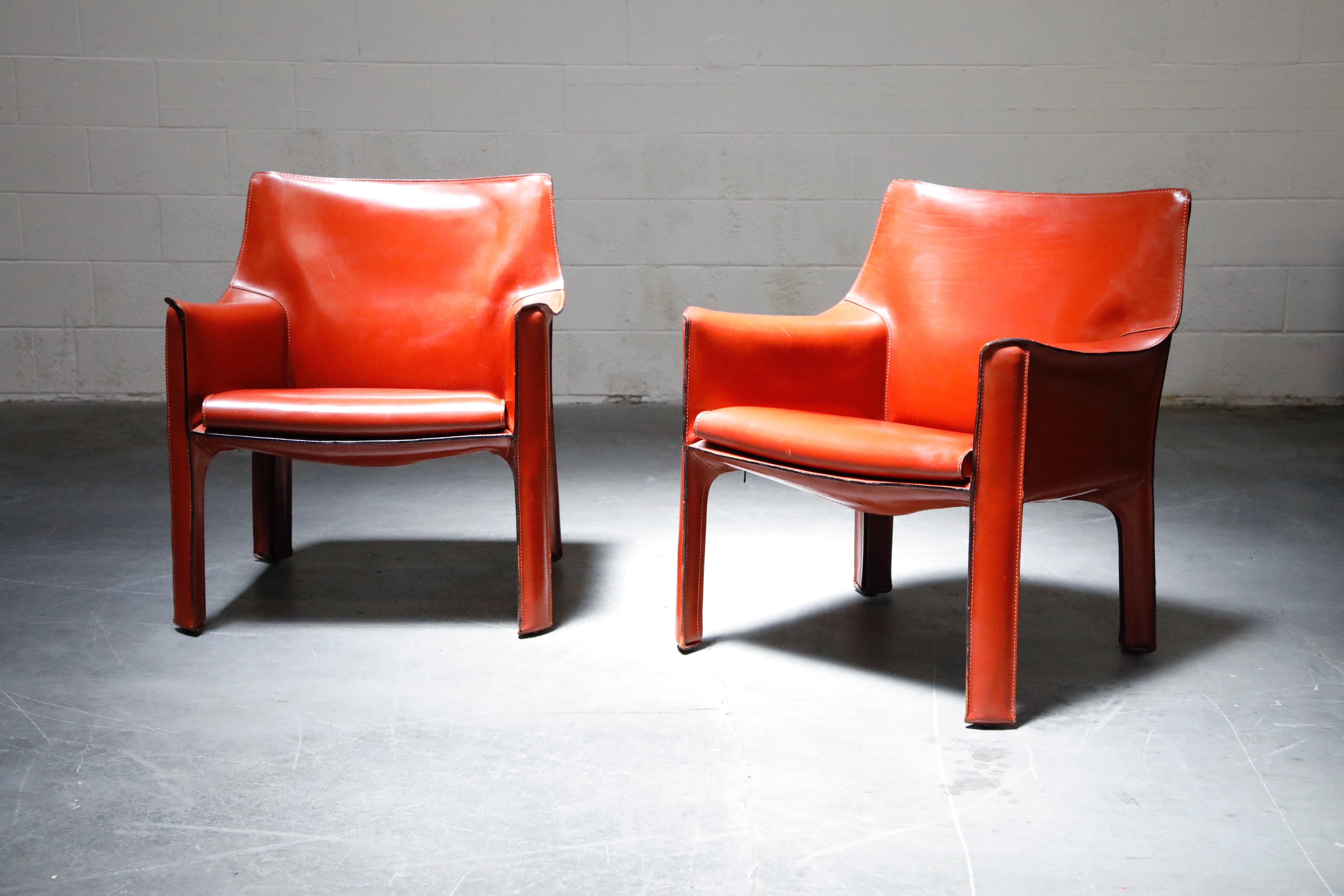 A beautiful pair of Mario Bellini Cab lounge chairs, Model #414, in exemplary condition, signed Cassina, designed in the 1970s. These Fine examples of the cab line by Mario Bellini for Cassina are Classic staples for luxury interior designers and