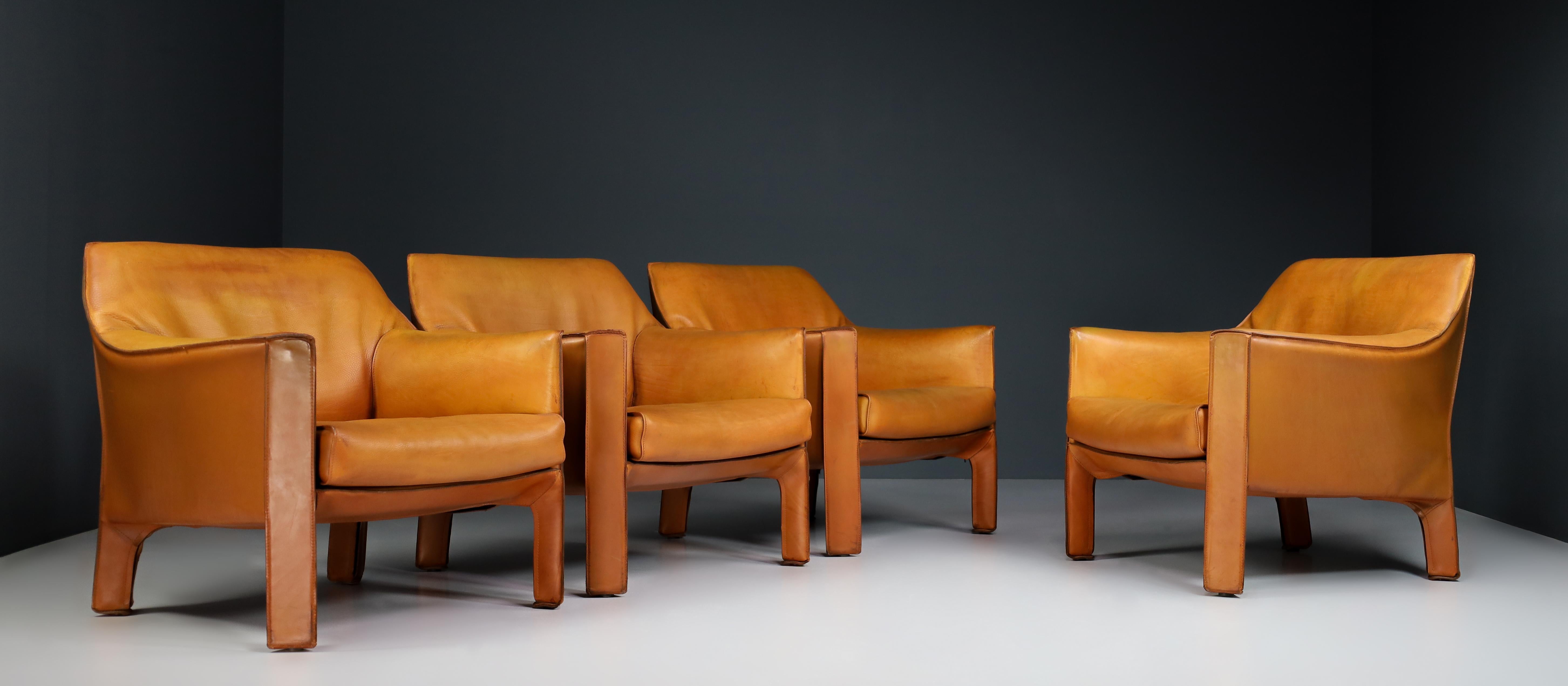 A beautiful set of four (4) rare out-of-production Mario Bellini Model 415 'Cab' Club Chairs in incredible thick Patinated Buffalo Cognac leather, by Cassina (signed), designed in the 1970s, these early production examples produced in circa 1980s.