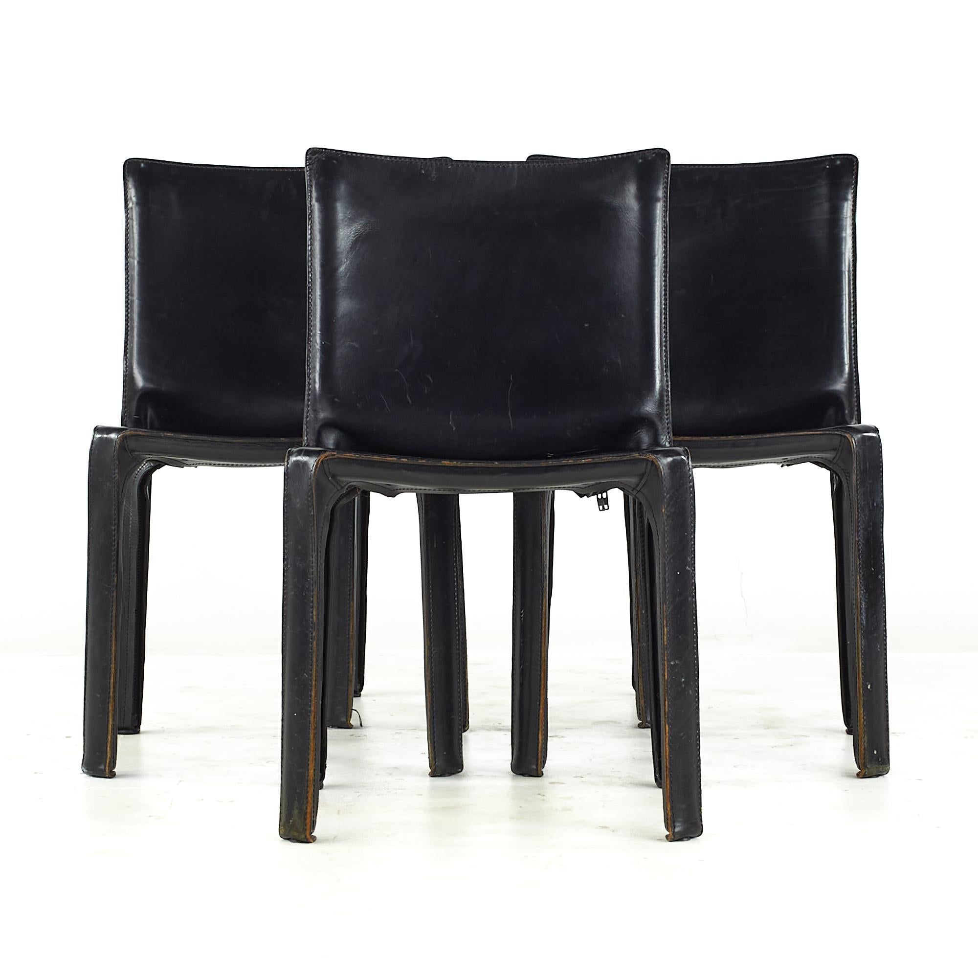 Mario Bellini for Cassina midcentury Cab Side Chairs – Set of 4

Each chair measures: 18.5 wide x 17.5 deep x 31.5 inches high, with a seat height/chair clearance of 17.5 inches

All pieces of furniture can be had in what we call restored
