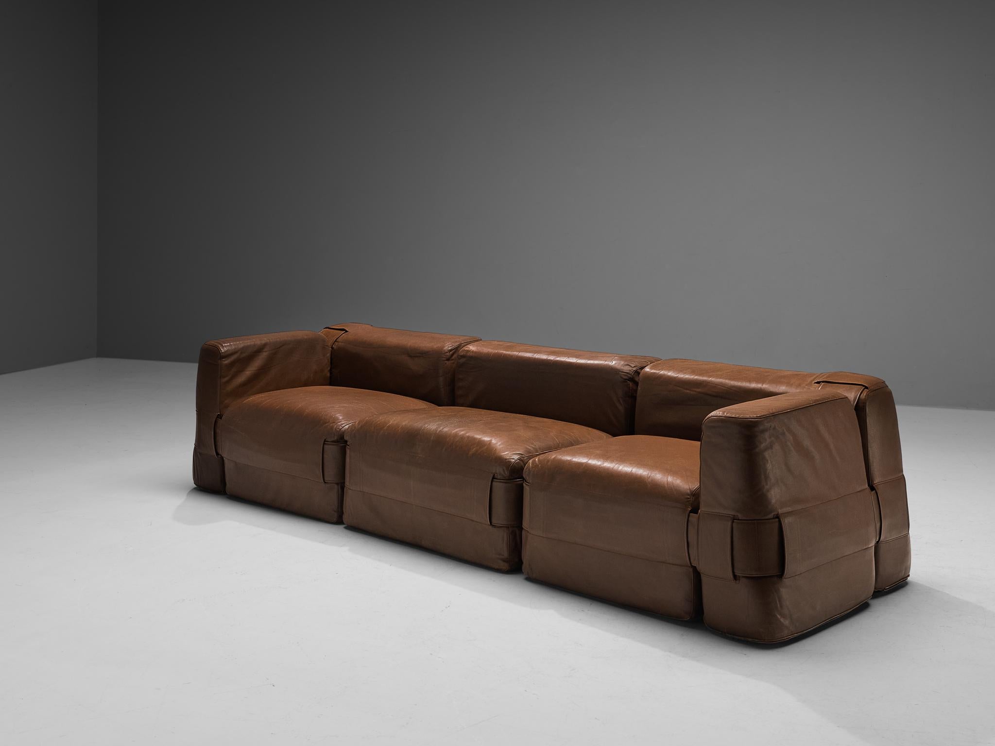 Mario Bellini for Cassina, 'Quartet' sofa model 932, leather, metal, Italy, 1964

Mario Bellini designed this modular sofa for Cassina. The sofa is a reinterpretation of classic furniture that always uses padded cushions. He experimented with these