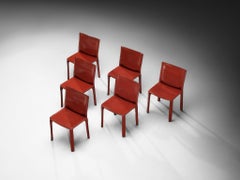Mario Bellini per Cassina: set di sei sedie da pranzo “Cab” in pelle rosso-marrone