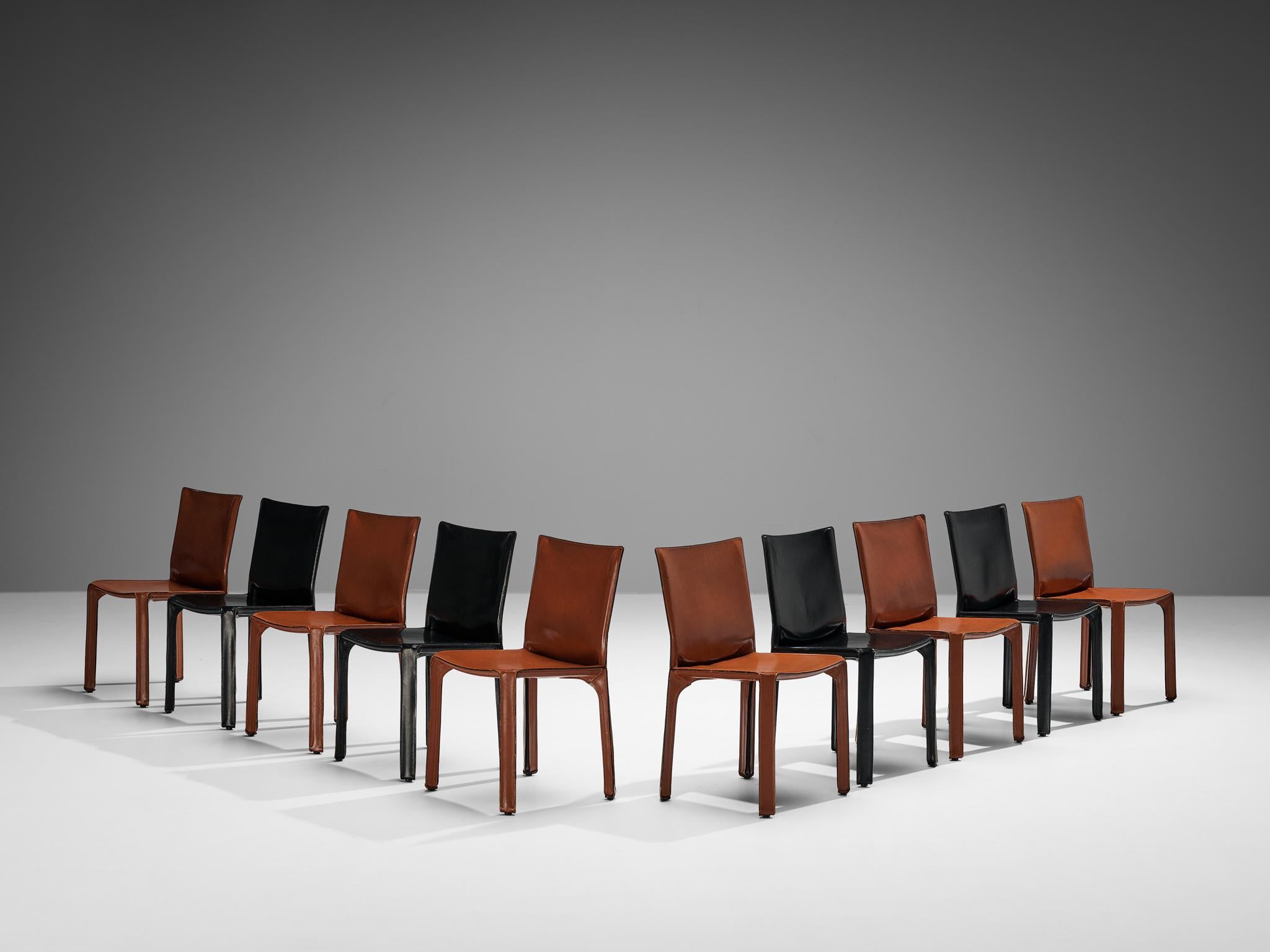 Mario Bellini for Cassina, set of ten 'cab' dining chairs model 412, cognac and black leather, Italy, 1976.

Beautiful bicolor set of ten chairs designed by Mario Bellini and executed in red cognac and black leather.  Conceptually, the chair was