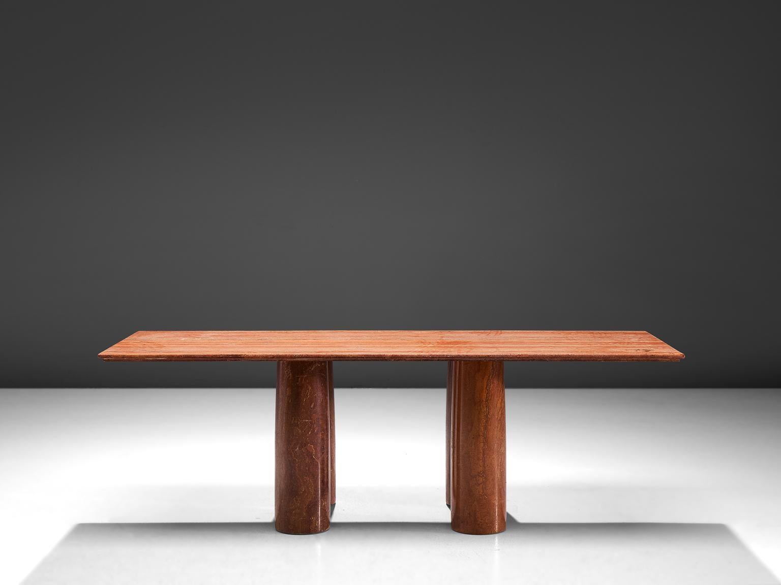 Mario Bellini 'Il Colonato' table, red travertine, Italy, 1970s

This 'Il Colonnato' dining table was designed by Italian designer Mario Bellini. For this series of tables, Bellini was inspired by ancient Roman columns. This table consist of four