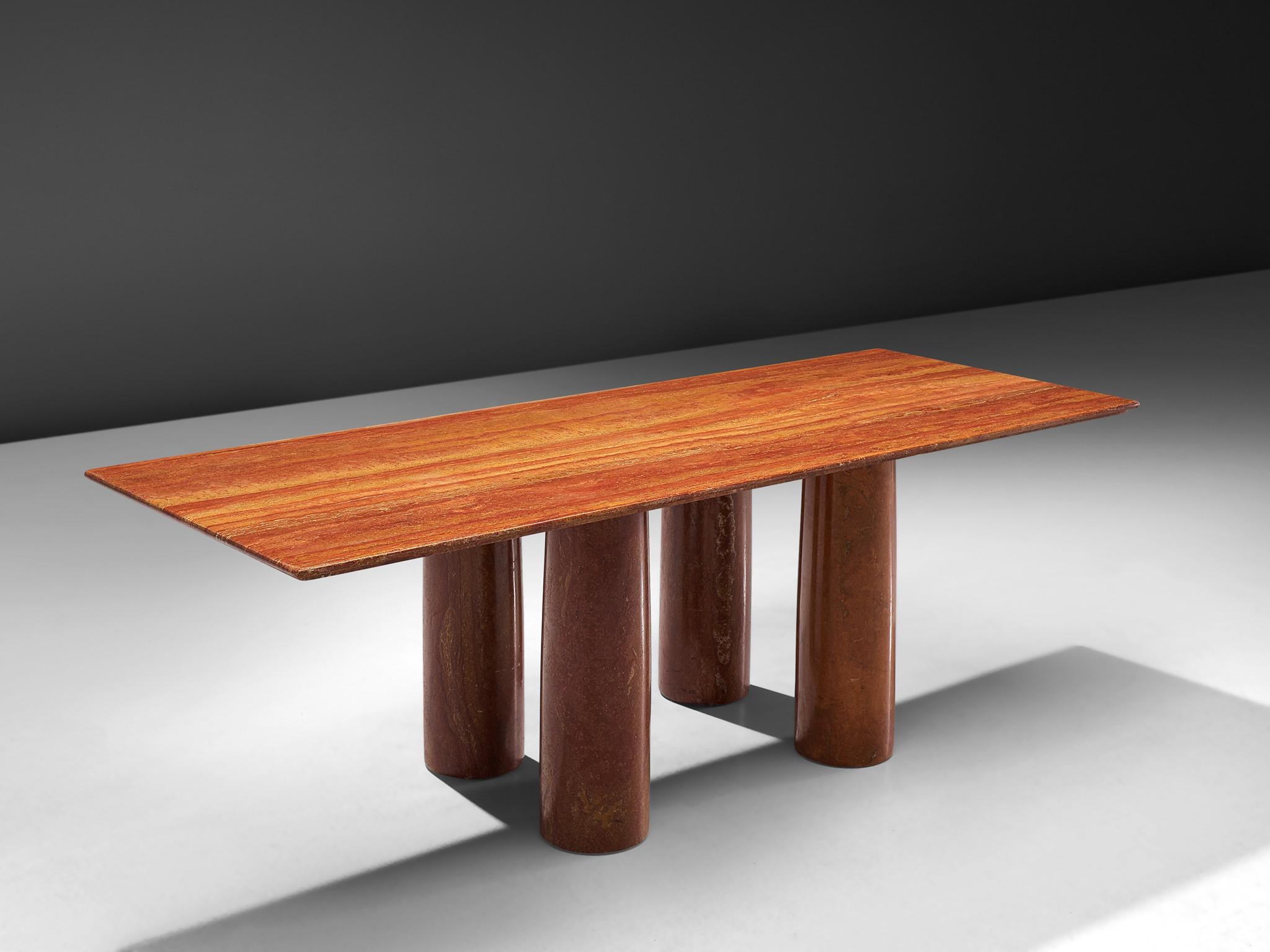 Mario Bellini 'Il Colonato' table, red travertine, Italy, 1970s.

This 'Il Colonnato' dining table was designed by Italian designer Mario Bellini. For this series of tables, Bellini was inspired by ancient Roman columns. This table consist of four