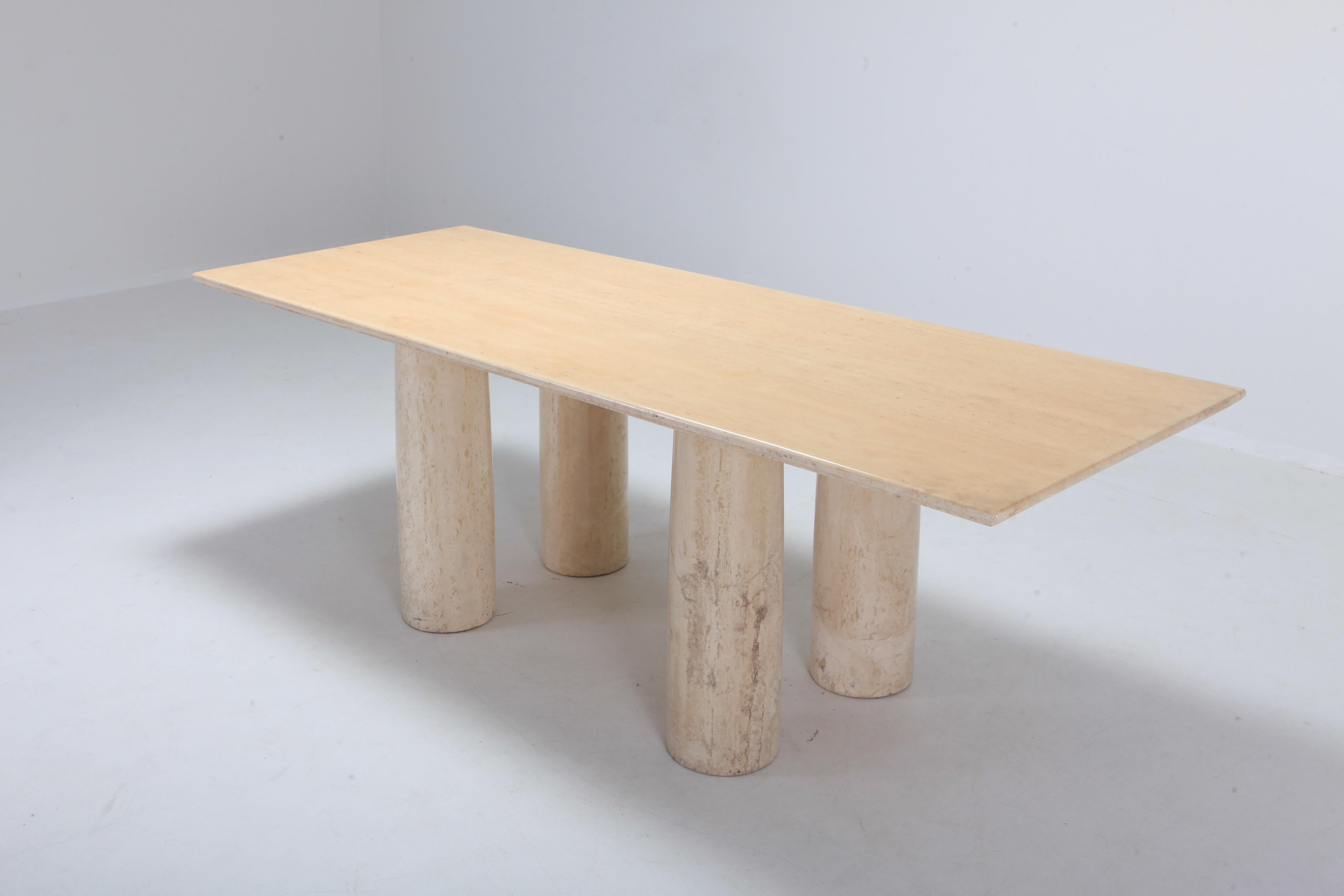 Postmodern travertine dining table by Mario Bellini
Mid-Century Modern luxury dining or conference table.
Together with Angelo Mangiarotti and Carlo Scarpa he has made the most inspiring marble pieces.
Fits as well in a 'nude' Minimalist interior