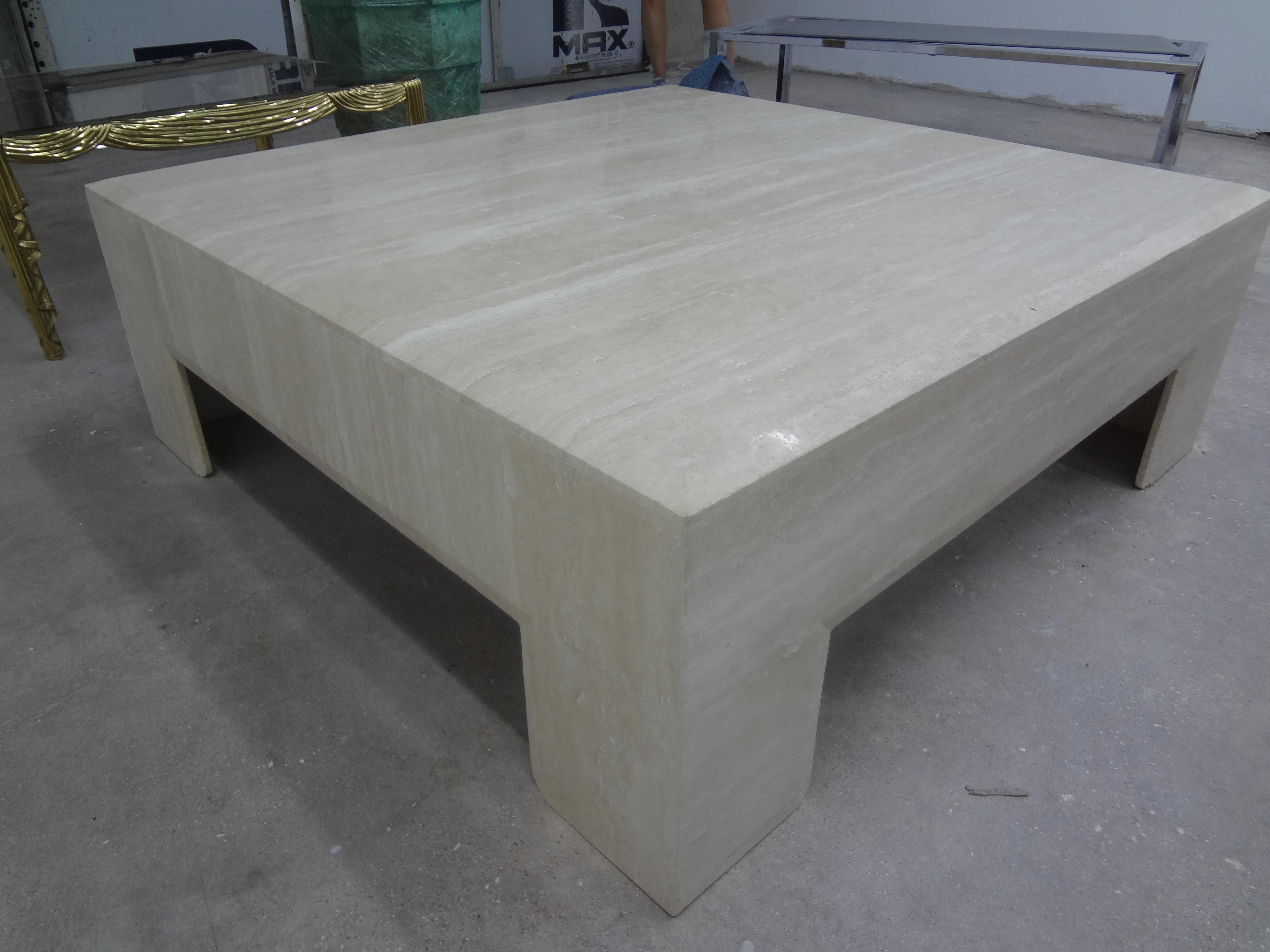 Mario Bellini inspired postmodern square Italian travertine coffee table or cocktail table. This stunning well made Italian travertine coffee table has an interesting chamfered edge detail and would work in a variety of interiors.
    