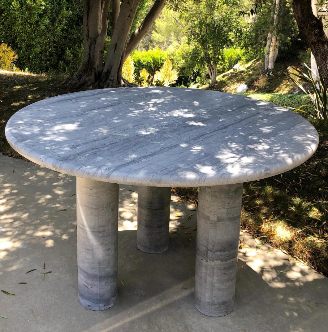 Monumental round dining table for entry or entertaining. Interpreted with moveable legs to personalize this home design statement.