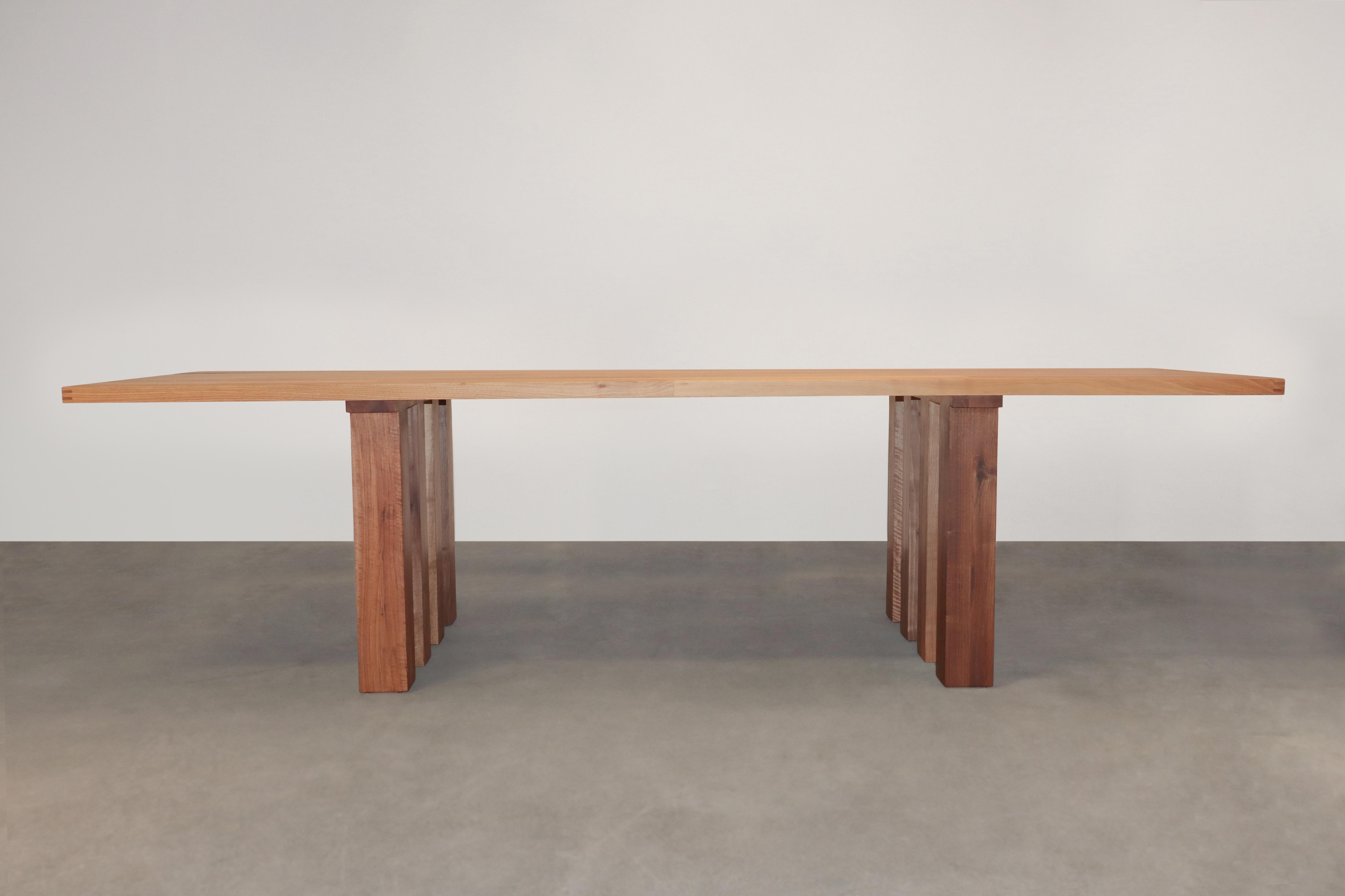 La Basilica is an architectural dining table designed by Mario Bellini in 1978 for Cassina, Italy. Large variant, comfortably seats 8 armchairs.

It is constructed of thick solid European Walnut and has been professionally restored with a