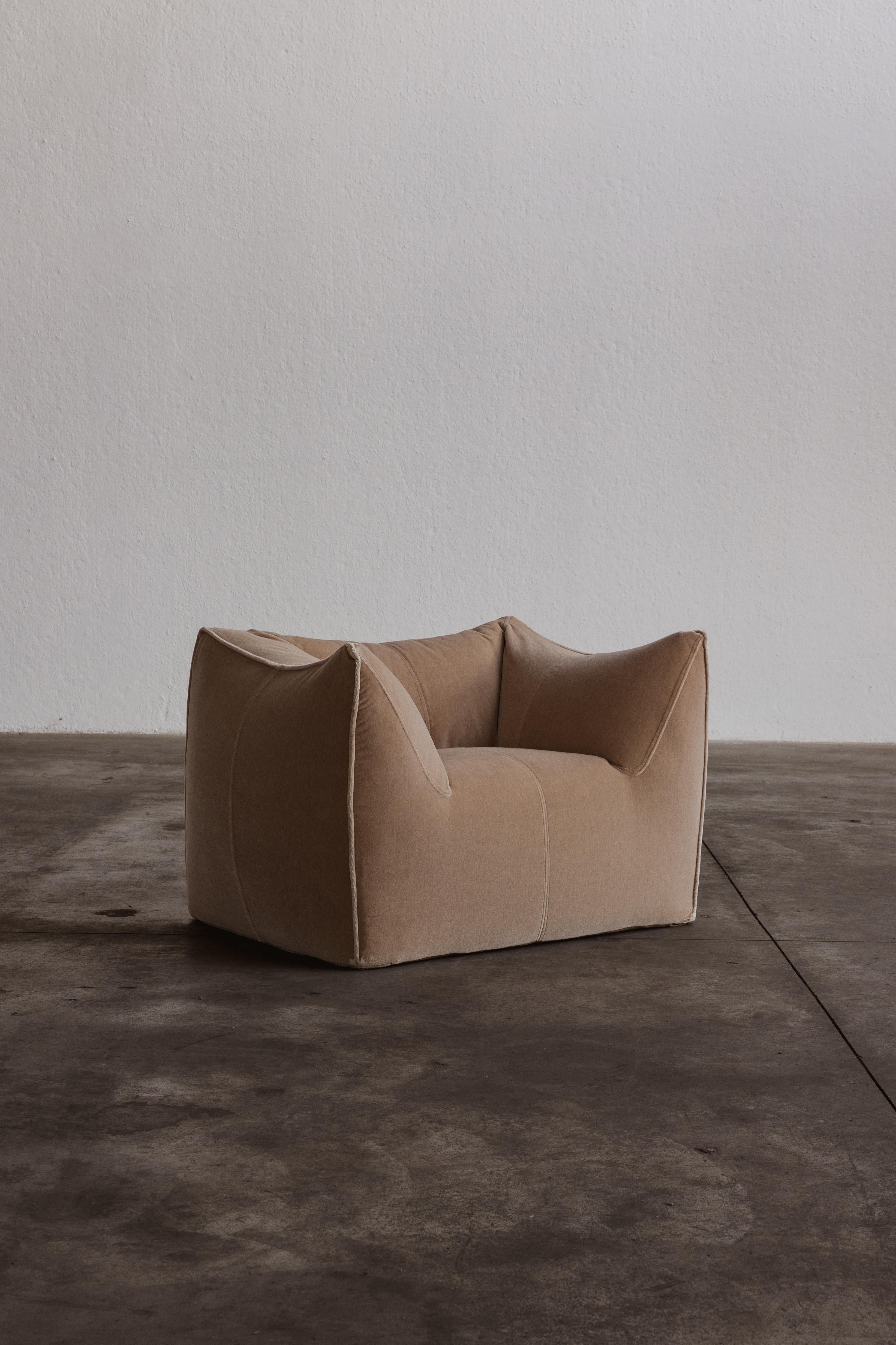 Mario Bellini “Le Bambole” armchairs for B&B Italia, camel velvet, Italy, 1971.

The search for a new shape for upholstered furniture: all parts are shaped like a large soft cushion. If we take apart 