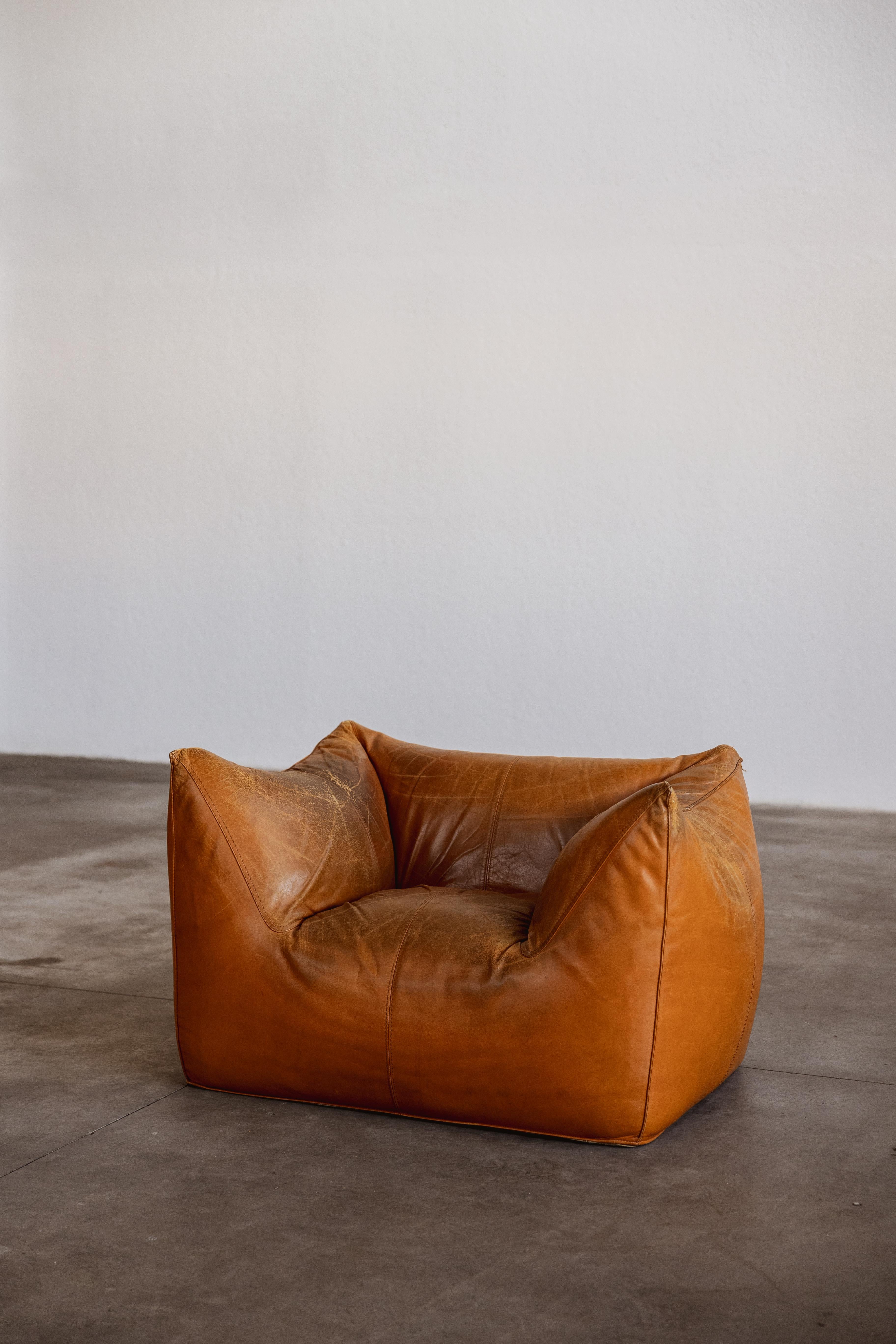 Mario Bellini “Le Bambole” armchair for B&B Italia, original cognac leather, Italy, 1971

The search for a new shape for upholstered furniture: all parts are shaped like a large soft cushion. If we take apart 