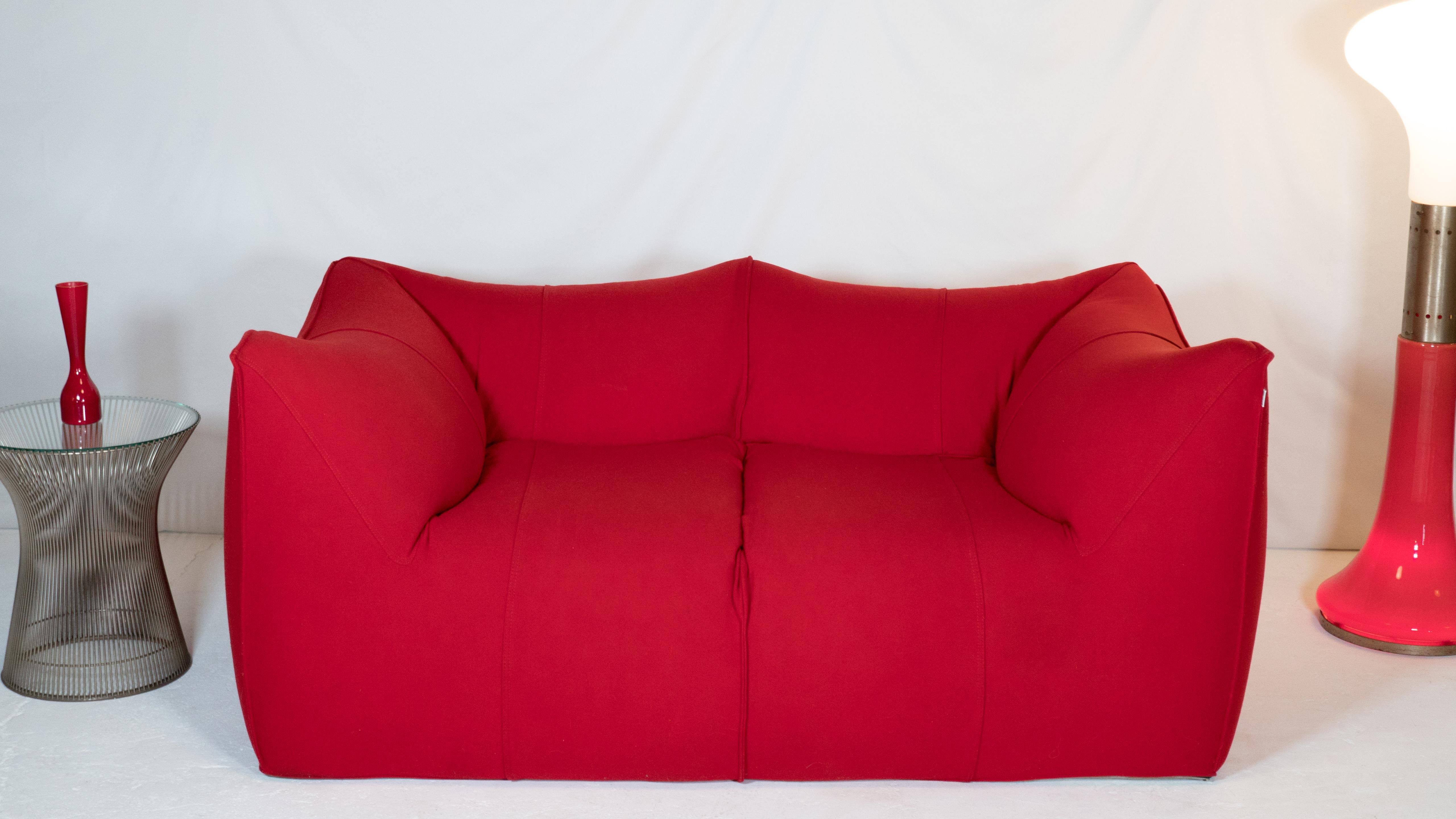 Le Bambole' sofa designed by Mario Bellini for B&B Italia, circa 1990s. Wrapped in thick original red wool upholstery. Le Bambole envisaged a “fabric containing a soft body” with naturalness of shape and form. Playful informality with functional