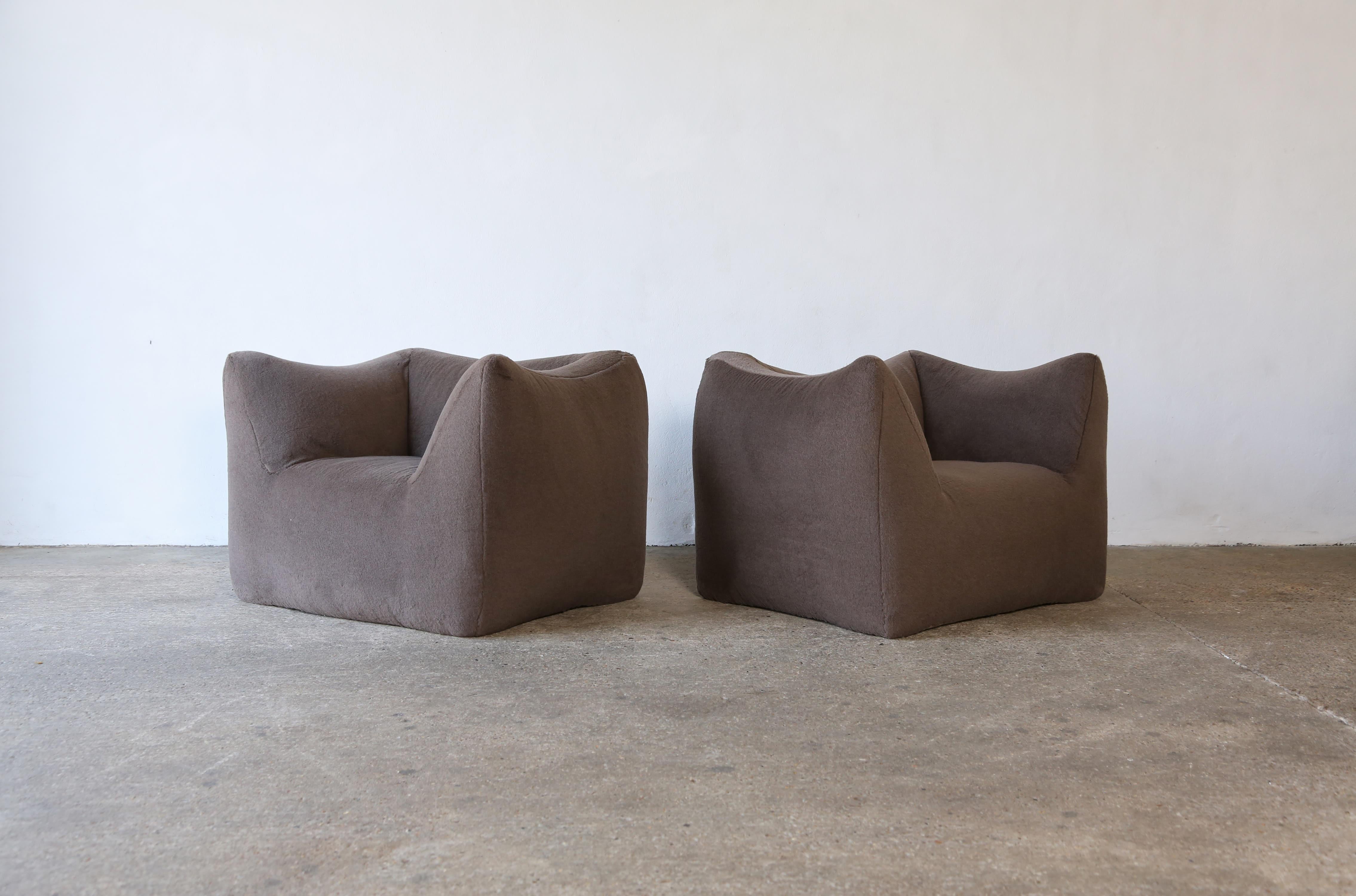 A beautiful pair of Mario Bellini Le Bambole lounge chairs, newly upholstered in a premium brown / grey 100% Alpaca fabric, produced by B&B Italia, Italy in the 1970s. Fast shipping worldwide.



