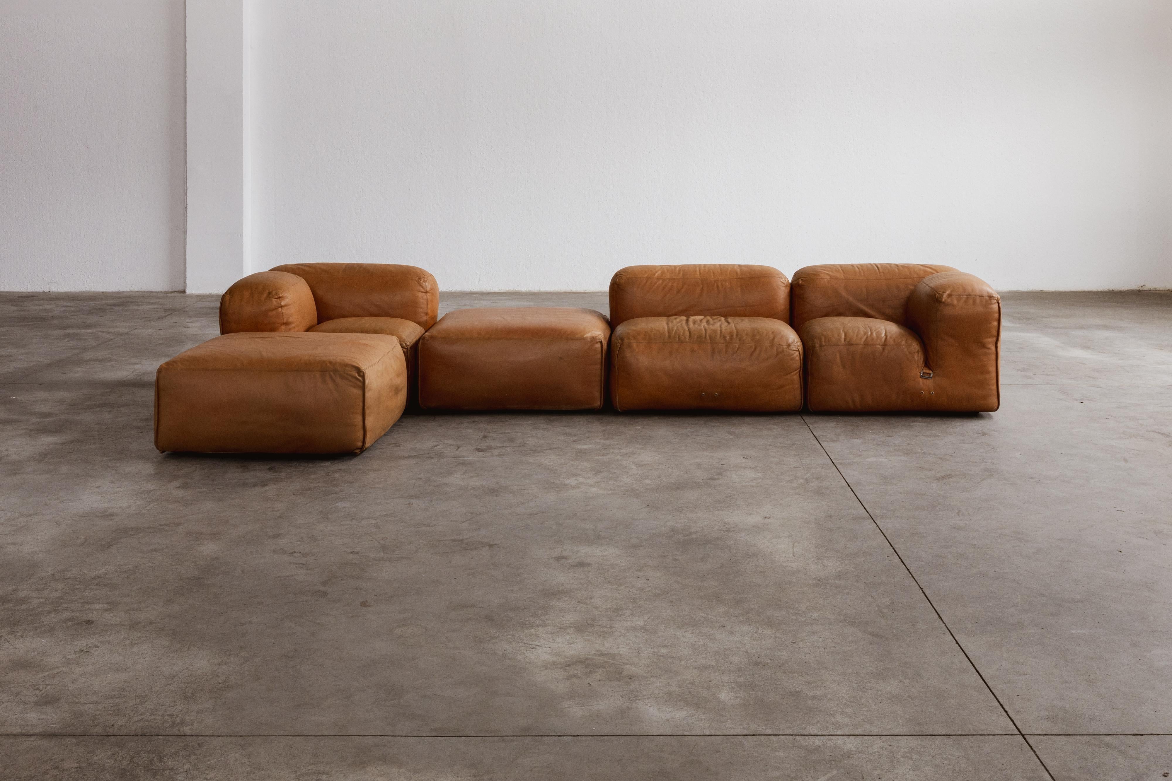 Mario Bellini “Le Mura” modular sofa for Cassina, patinated cognac leather, Italy, 1972, set of 5.

Mario Bellini designed “Le Mura” modular sofa for Cassina in 1972, creating an iconic piece of industrial design. Bellini conceived this sectional