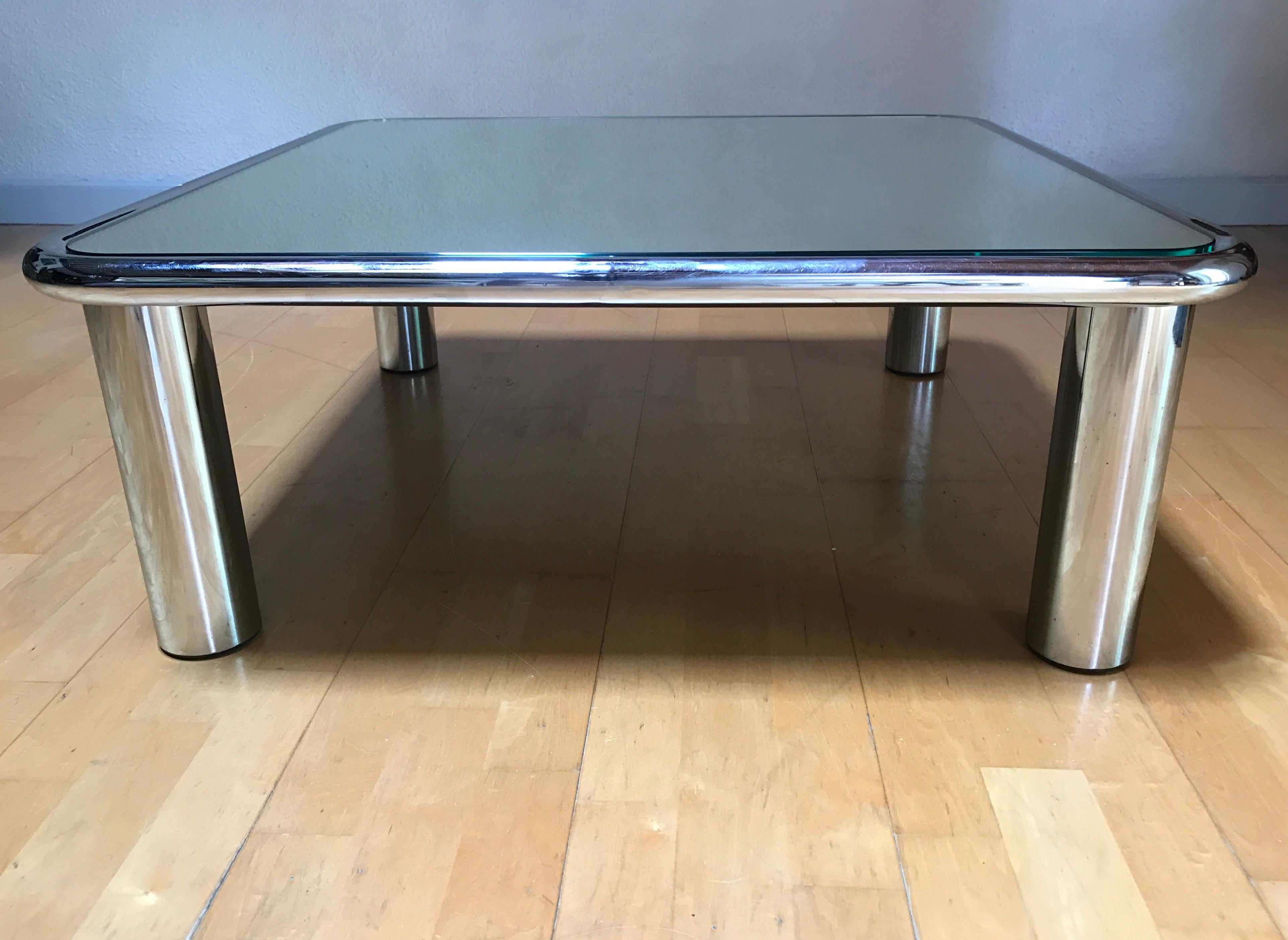 Mario Bellini
Mirror top chrome coffee table for Cassina Italy
Perfect condition
Measures: H 14.5 in. x W 35.25 in. x D 35.25 in.
H 36.83 cm x W 89.54 cm x D 89.54 cm.
 