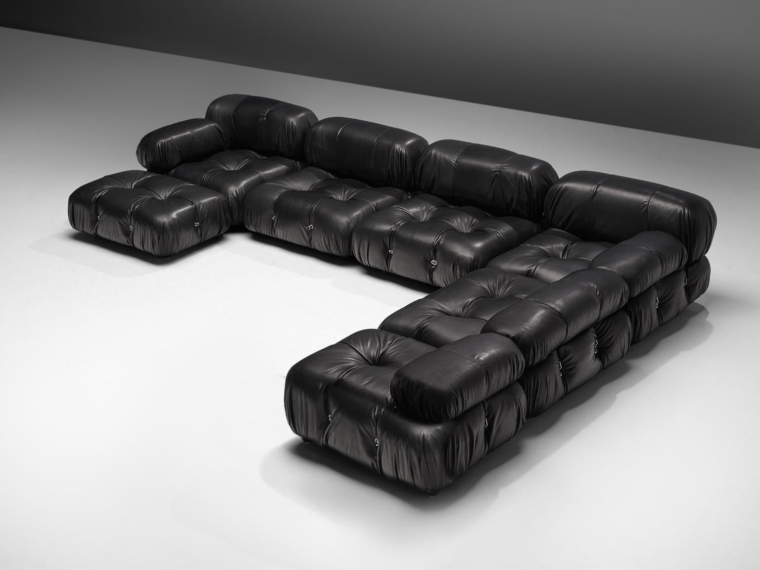 Mario Bellini, large modular 'Cameleonda' sofa, black leather upholstery, Italy, 1971, reupholstered by our in-house upholstery atelier. 

The sectional elements this sofa was made with can be used freely and apart from one another. The backs and