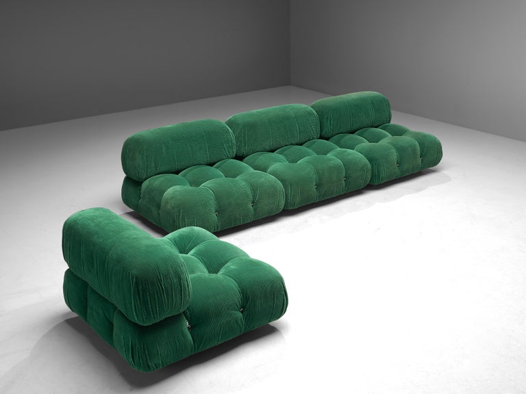 Mario Bellini, large modular 'Cameleonda' sofa, green fabric upholstery, Italy, designed in 1971

The sectional elements this sofa was made with can be used freely and apart from one another. The backs and armrests are provided with rings and