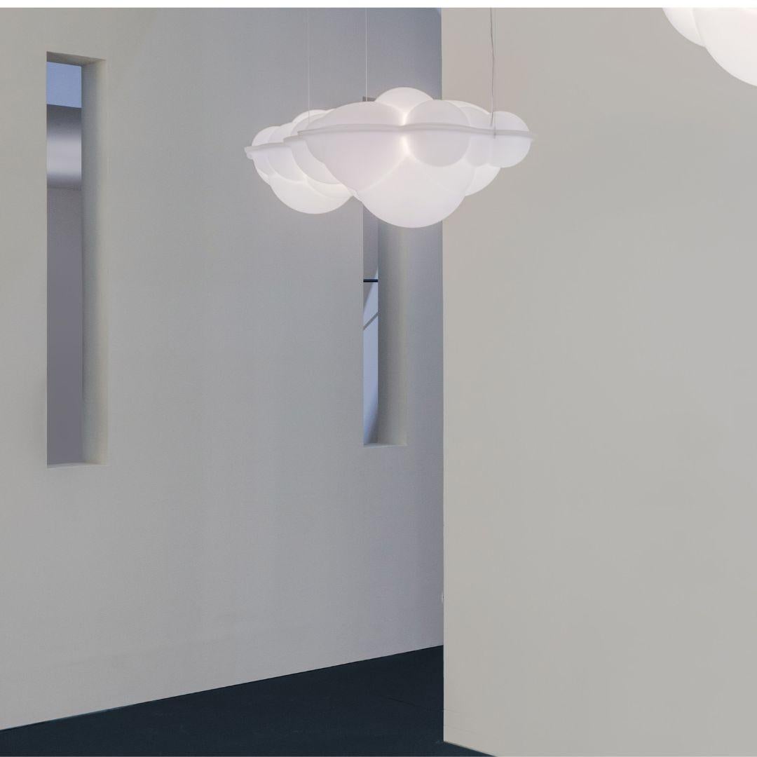 Mario Bellini 'Nuvola Minor' pendant for Nemo. 

A delightful cloud-shaped pendant lamp designed by Mario Bellini with the structure executed in a natural opal polyethylene. Crafted with rotational molding, the Nuvola Minor pendant casts a
