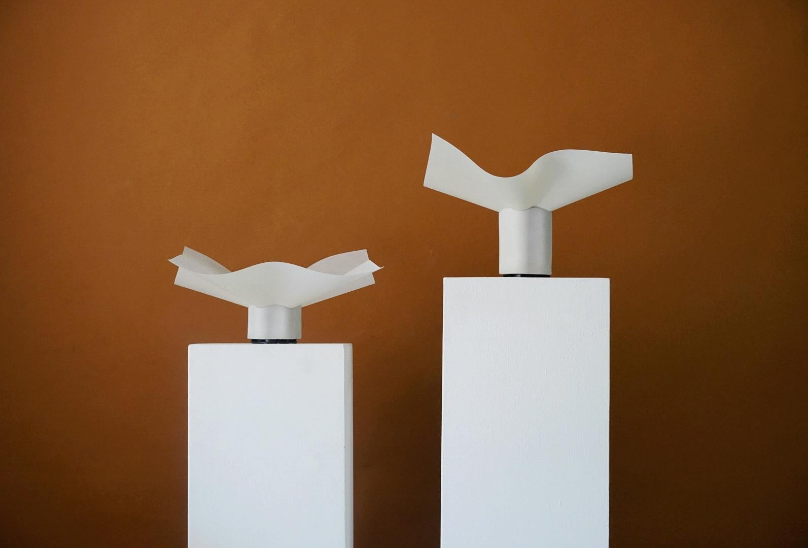 Rare pair of Mario Bellini pair of table lamps, Model Area 10 & Model Area 20, by designer Mario Bellini for Artemide, the 1970s. The Pair have a different height which makes them as a pair or grouping look special. This beautiful design by Mario