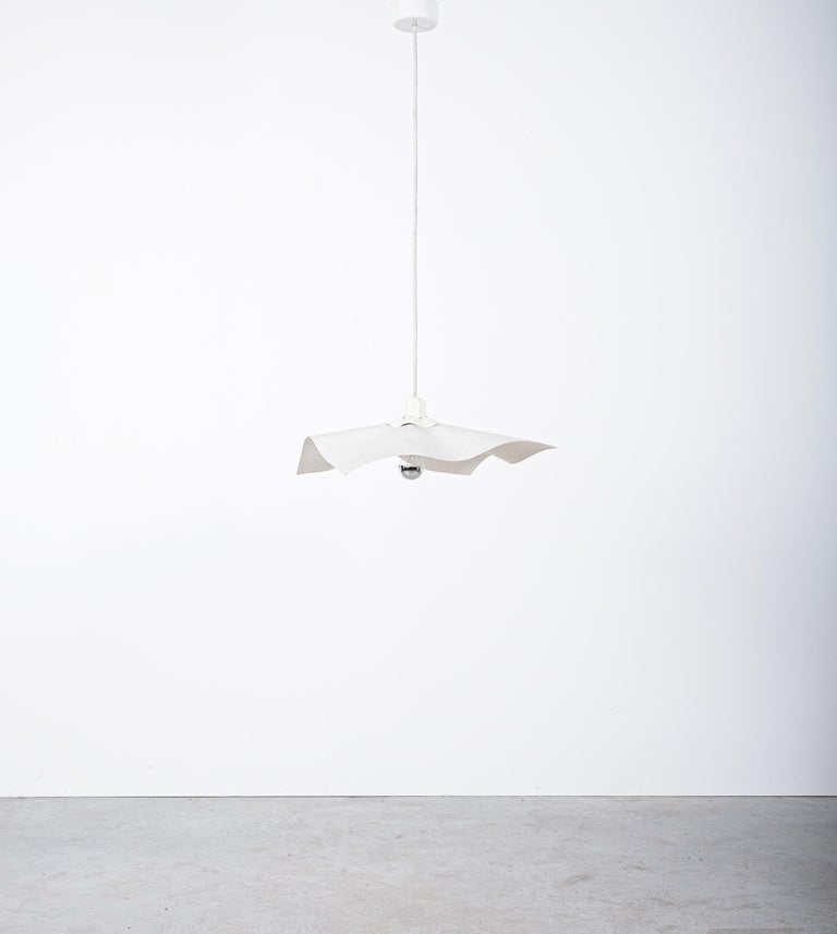 Pendant lamps (2x) Area 50 by Marco Bellini for Artemide, Italy, 1976

We have a pair available, priced and sold per piece.

Pair of Mario Bellini area pendant lamps. Very intelligently designed suspended lamps from a single flat piece of