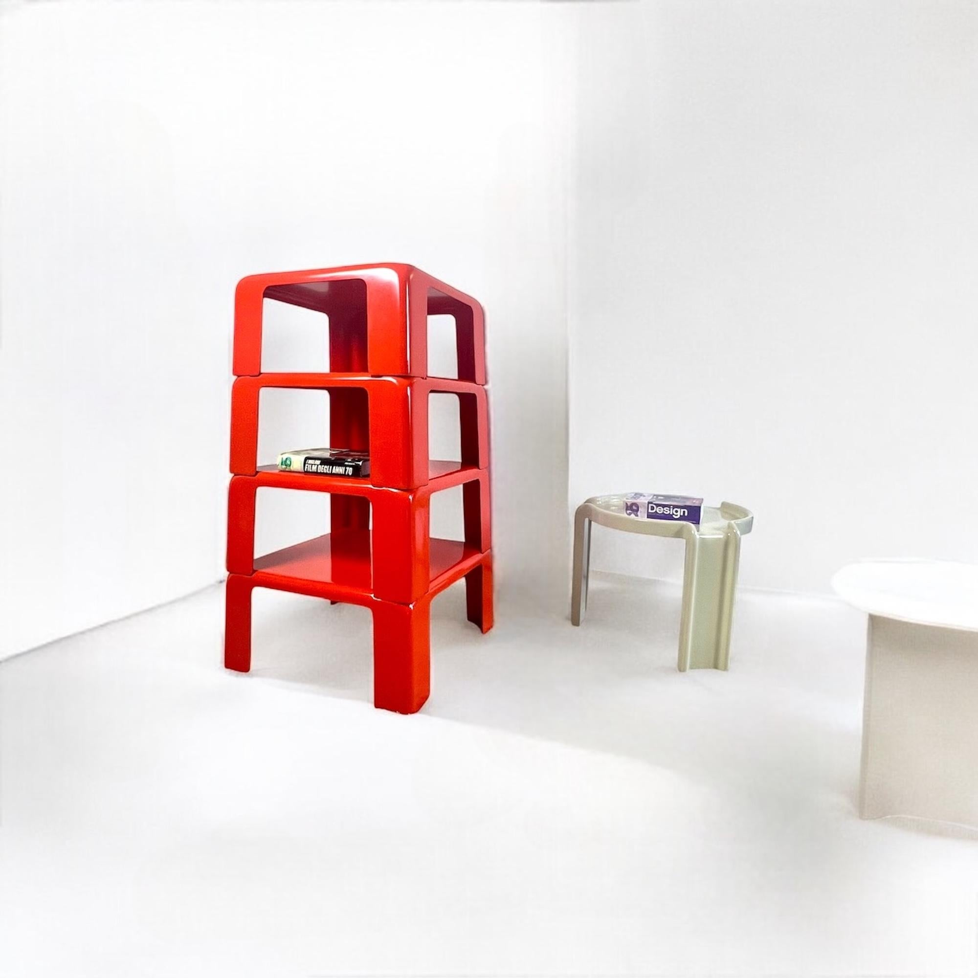 The ‘Quattro Gatti’ nesting tables, designed by Mario Bellini for C&B Meda Italia in 1967, are an exemplary work of 1960s Space Age furniture. Manufactured from durable ‘fiberlite’ resin, the tables display a vibrant orange tone, a rare find in