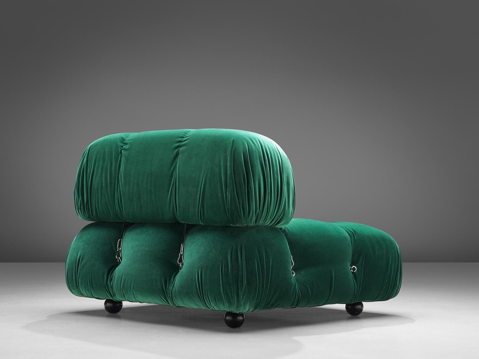 Mario Bellini, modular 'Cameleonda' sofa in green fabric, Italy, 1972.

The sectional elements of this can be used freely and apart from one another. The backs and armrests are provided with rings and carabiners, which allows the user to create a