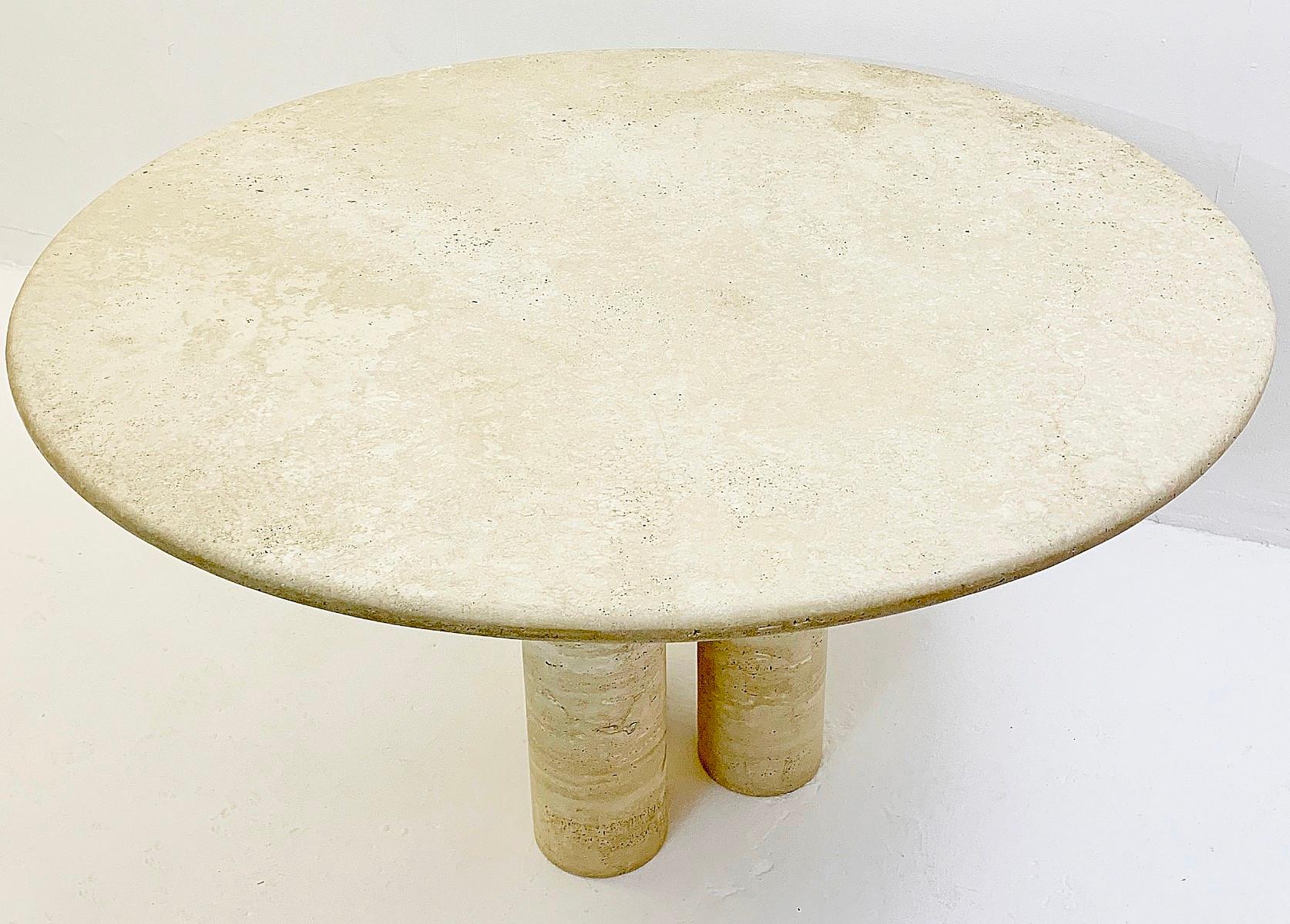 Mario Bellini round travertine dining table.