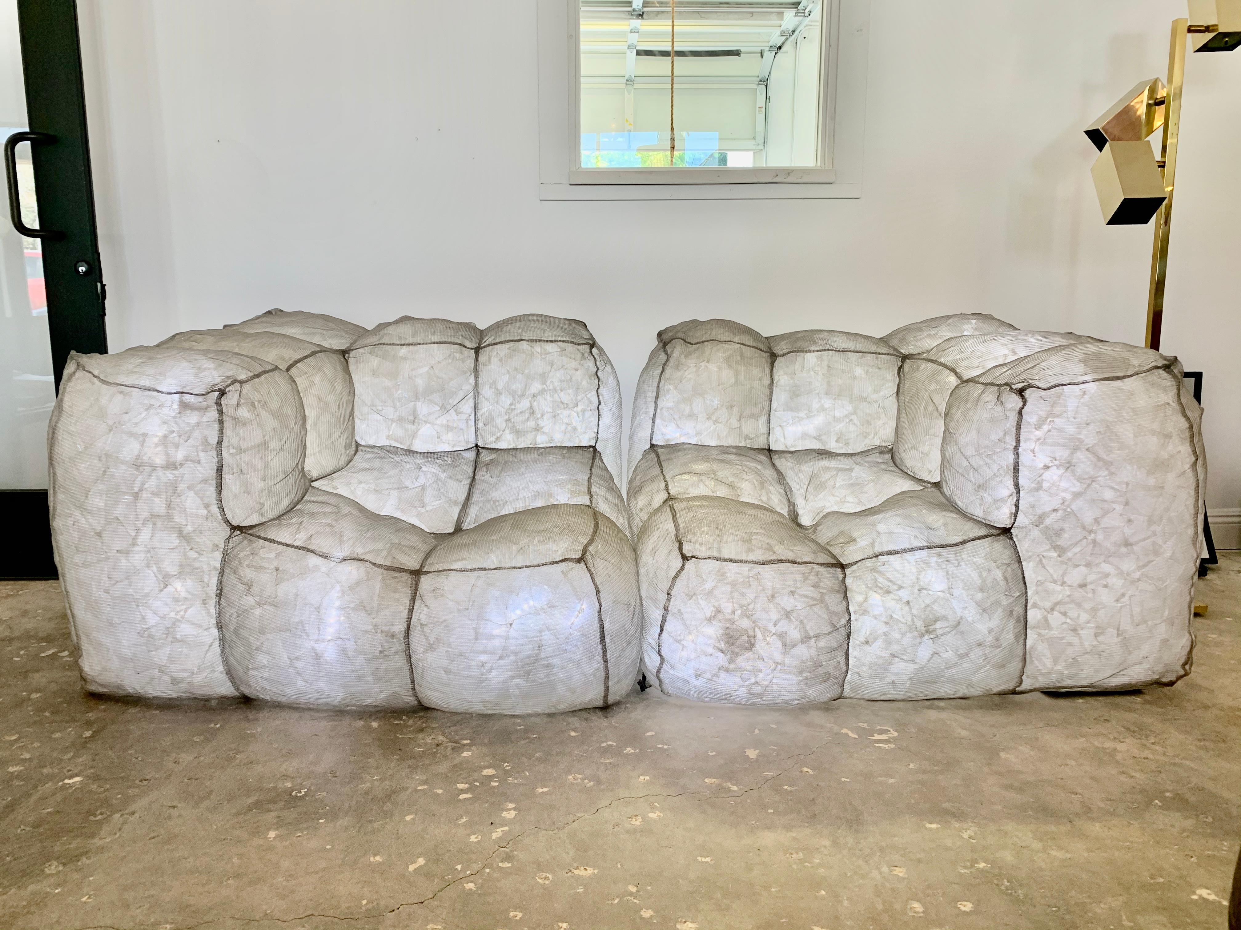 Stunning stainless steel mesh sofa by Mario Bellini with built in LED lights. Made for Meritalia in 2007. Original labels, hand-marked/numbered. Sofa comes with an illuminated pillow as well. Mesh sofa is filled with thousands of air packets.
