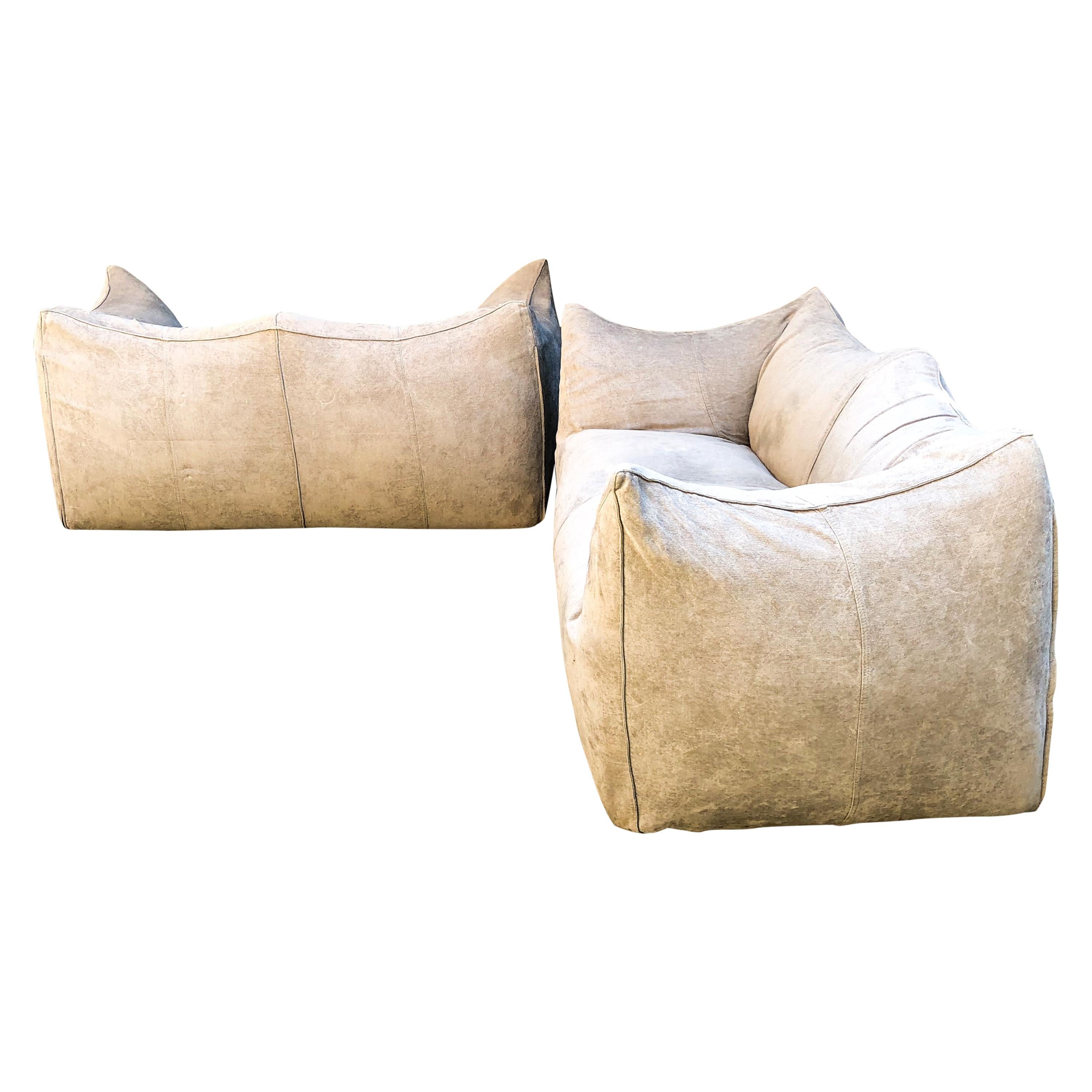 Set of 2 “Bibambola” sofa designed by Mario Bellini for B&B Italia.

Original vintage version from 1976, recently reupholstered by the previous owner with a light grey fabric.

This comfortable settee is bulky and playful, shaped as if it is merely